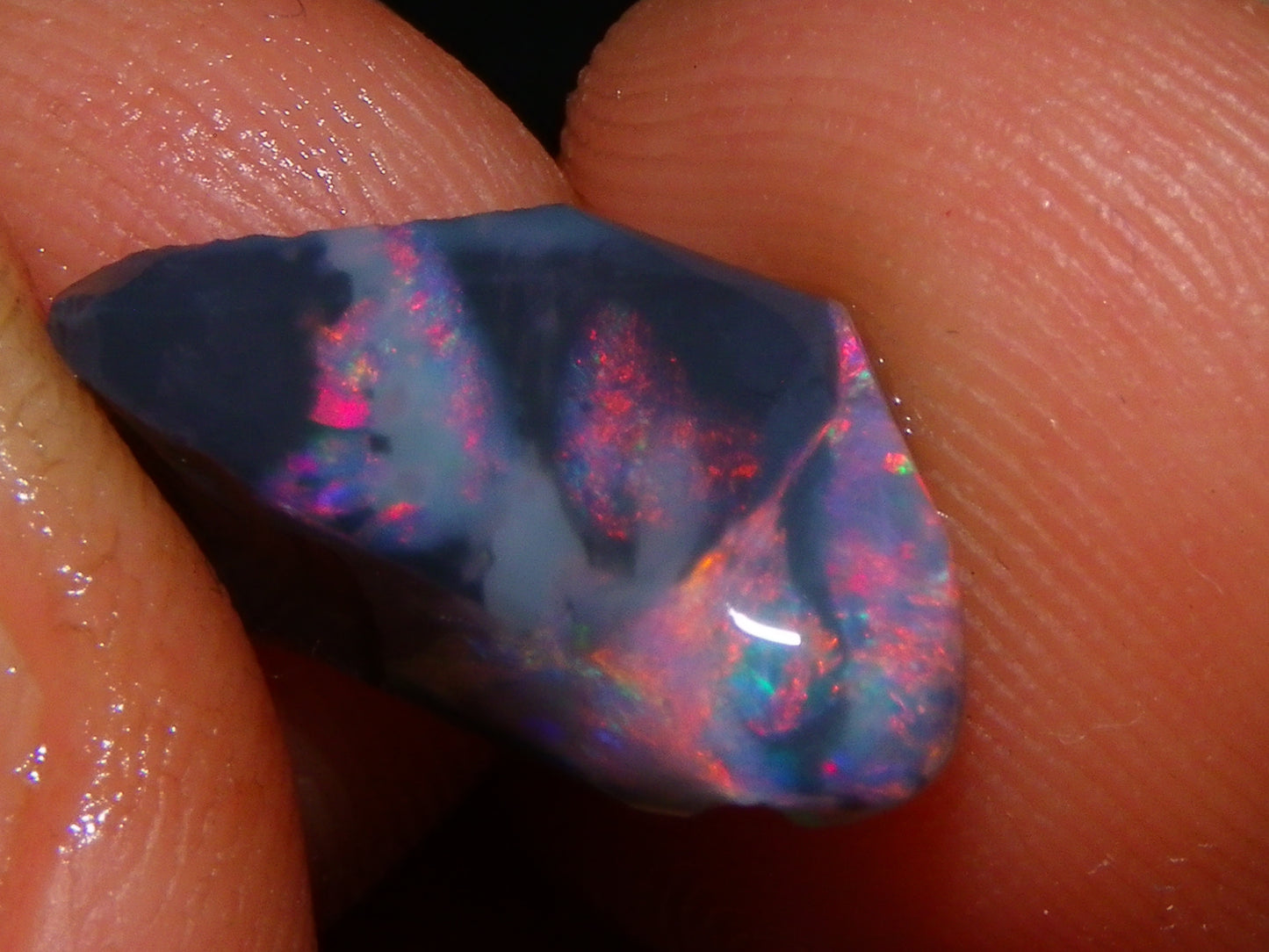 Nice Quality Rubbed Lightning Ridge Opal Parcel 18.04cts Dark Base Reds/Greens