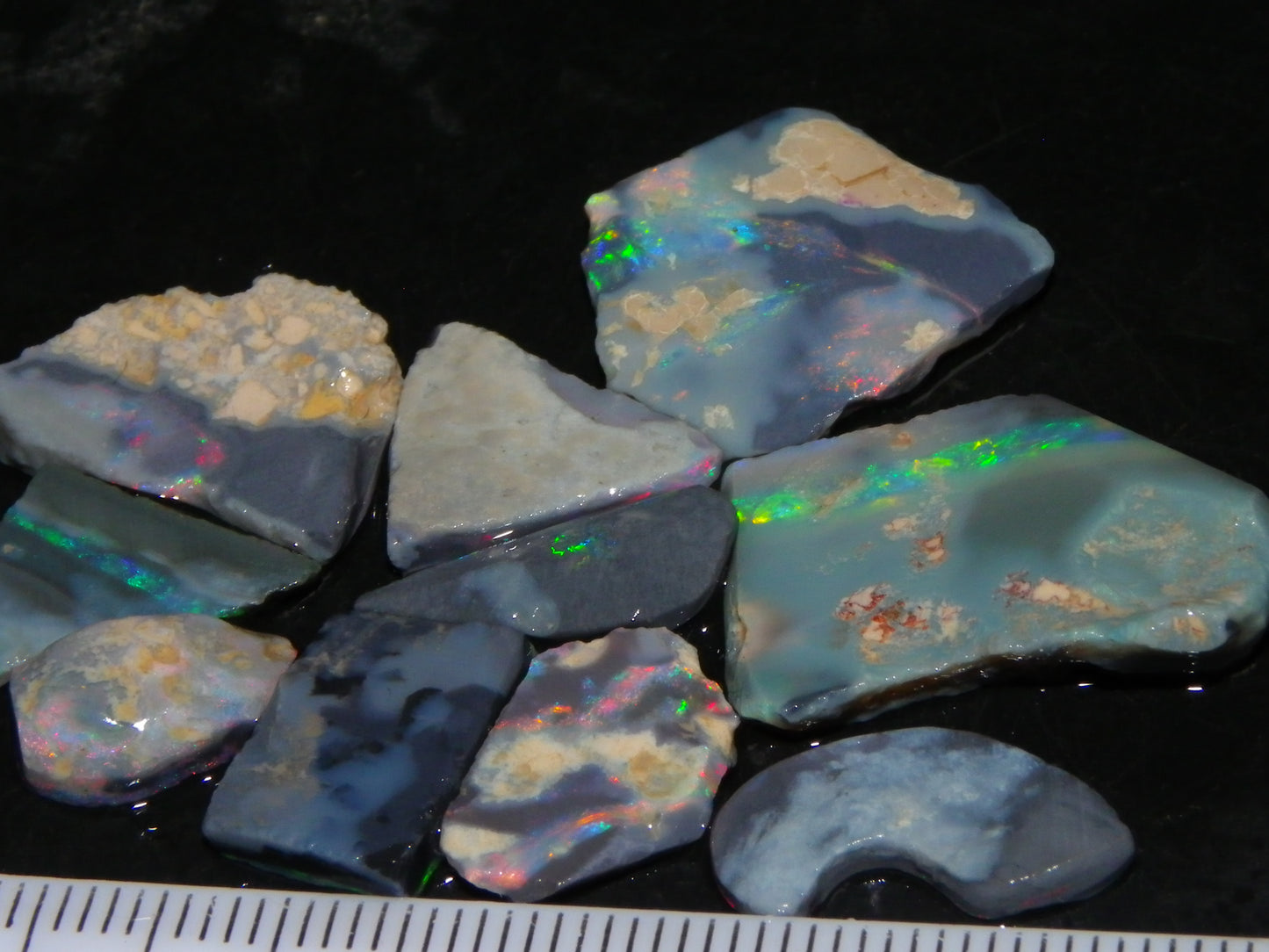 Nice Rough/Rubbed/Sliced Lightning Ridge Opal Parcel 32.9cts Red/Green Fires Dark Base