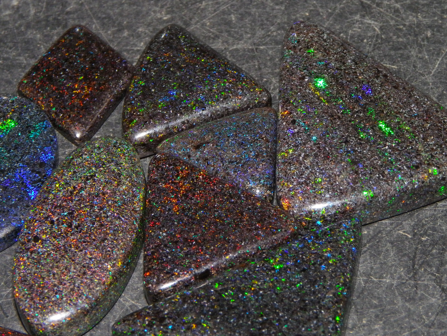 13 Nice Cut/Polished /Treated Andamooka Matrix Opals 143cts Red/Green/Blue Fires