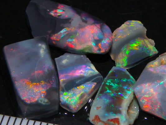 Nice Quality Rubbed Lightning Ridge Opal Parcel 18.04cts Dark Base Reds/Greens