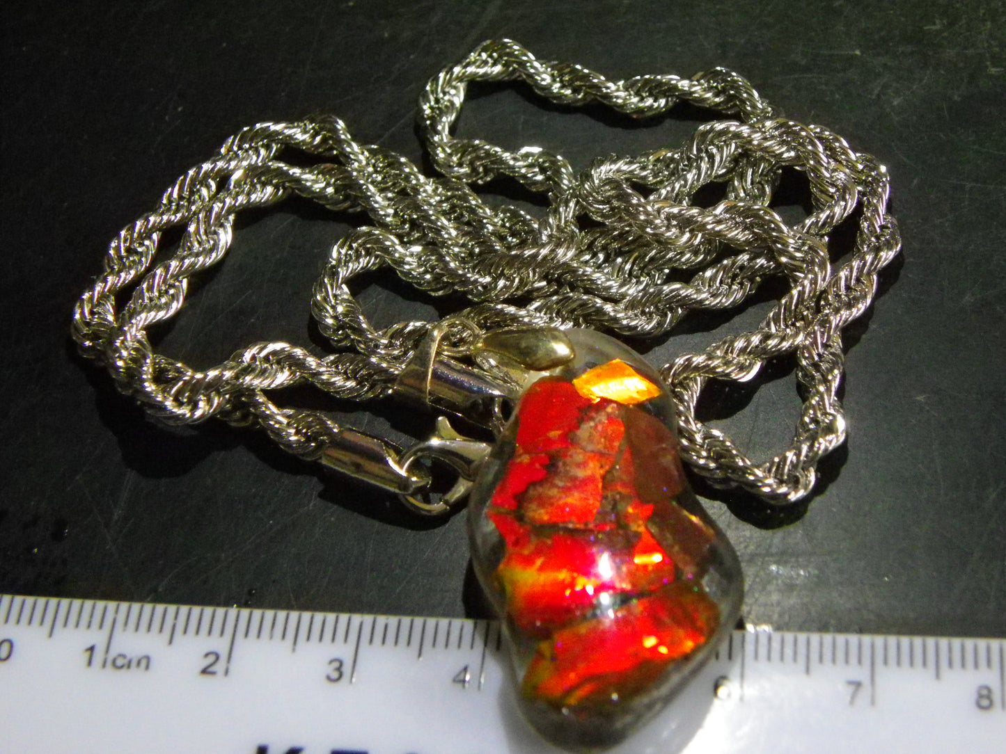 Nice Red/Orange Ammolite + resin Pendant 24cts ex Titanium Chain Bright Colours Alberta Canada