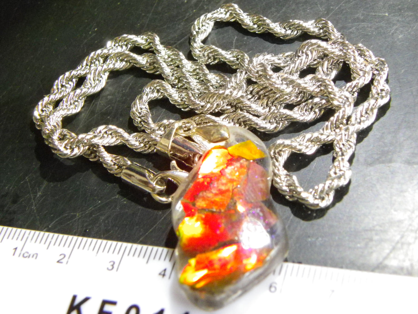 Nice Red/Orange Ammolite + resin Pendant 24cts ex Titanium Chain Bright Colours Alberta Canada