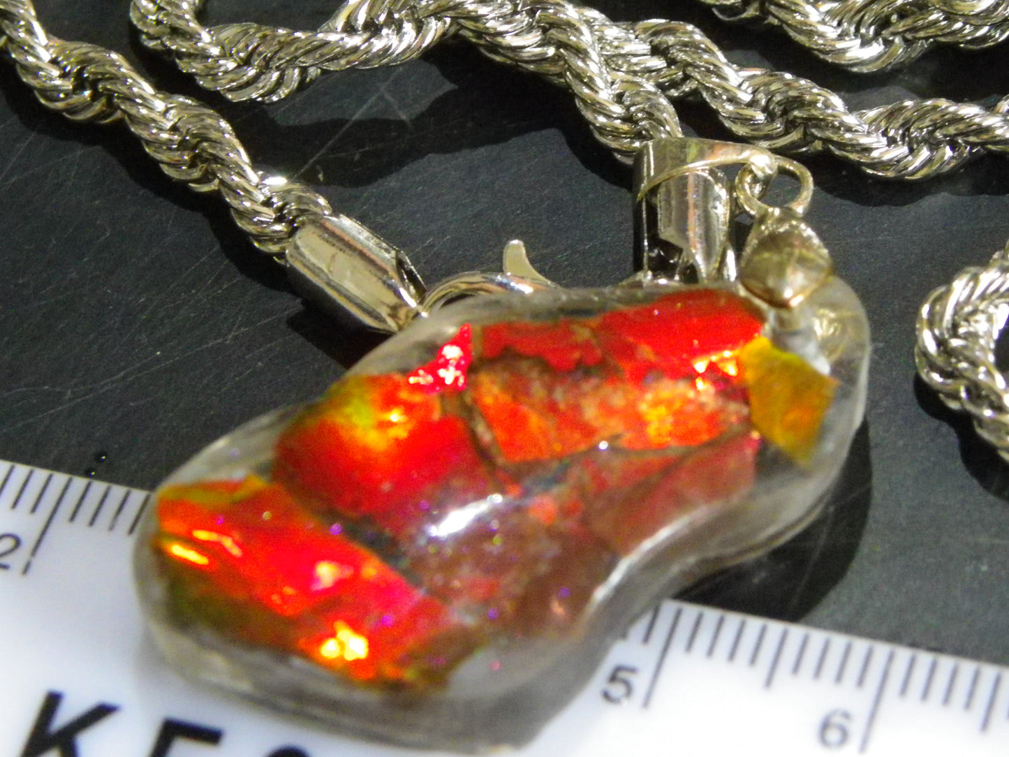 Nice Red/Orange Ammolite + resin Pendant 24cts ex Titanium Chain Bright Colours Alberta Canada