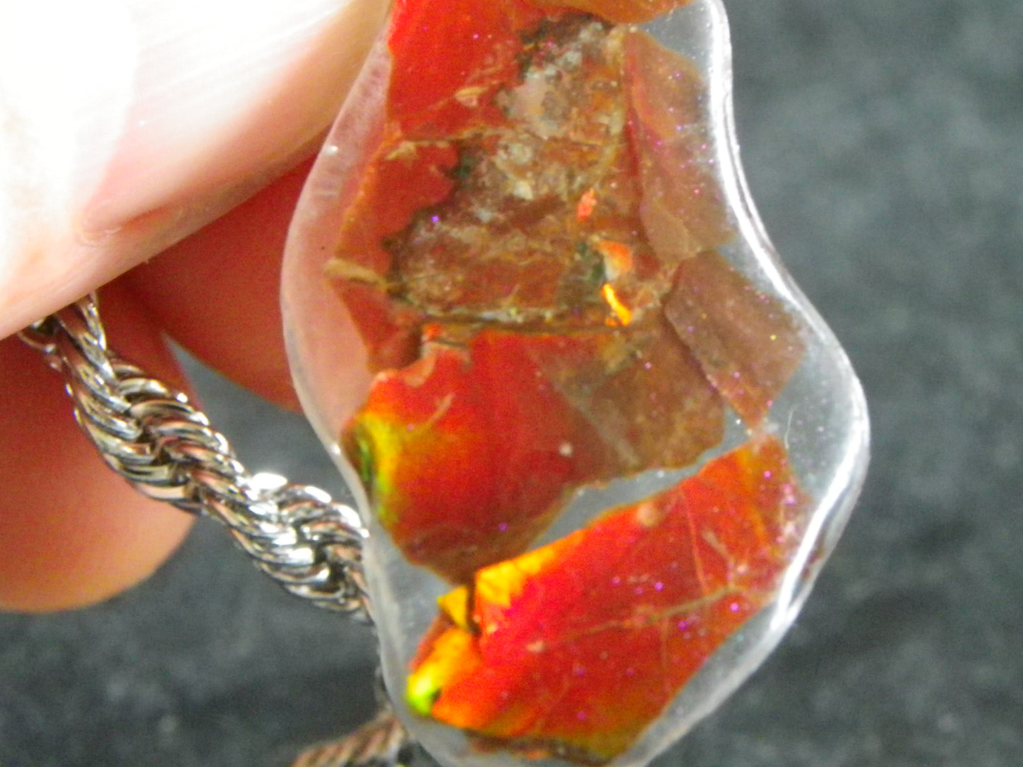 Nice Red/Orange Ammolite + resin Pendant 24cts ex Titanium Chain Bright Colours Alberta Canada