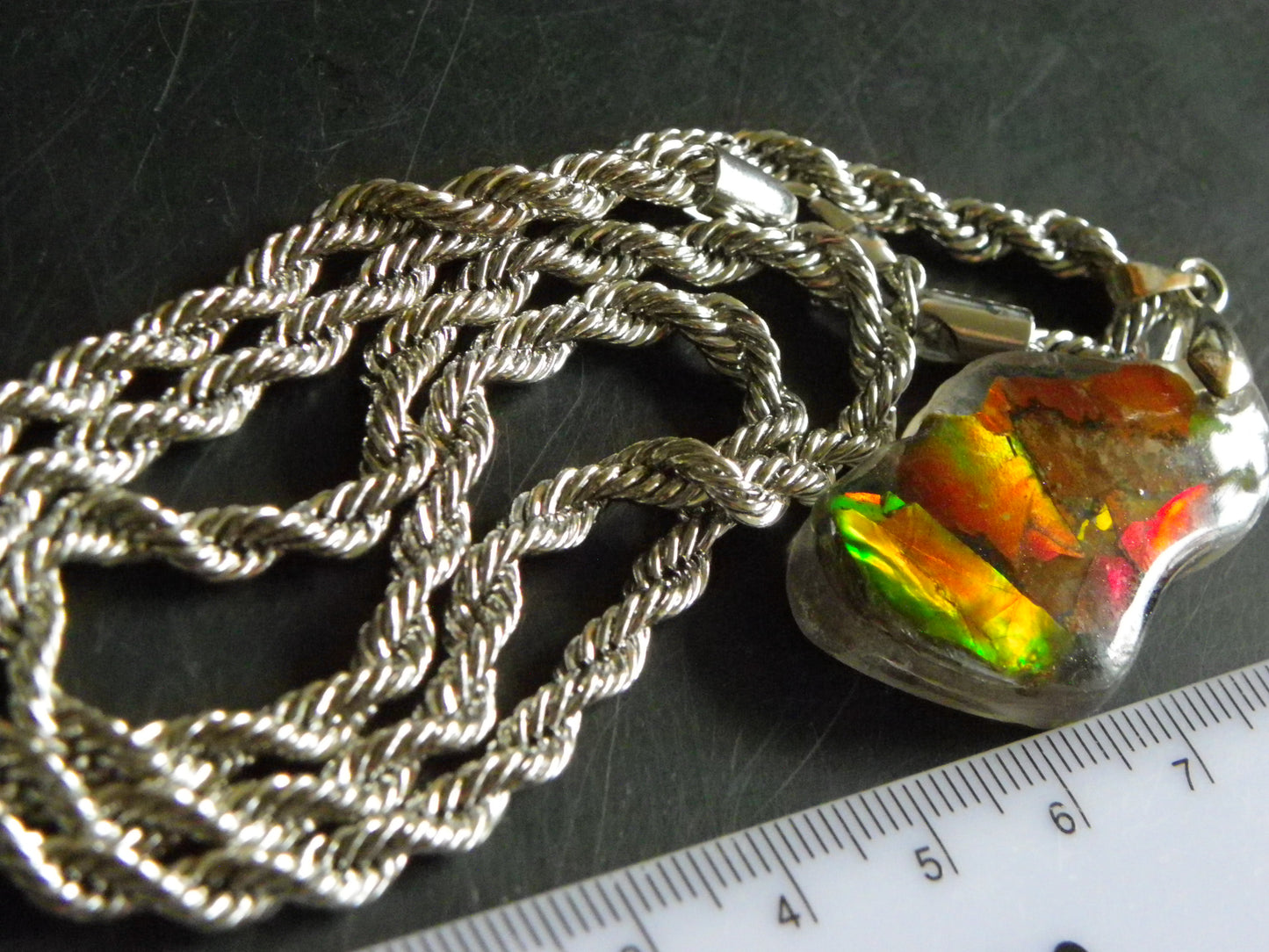 Nice Red/Orange Ammolite + resin Pendant 24cts ex Titanium Chain Bright Colours Alberta Canada