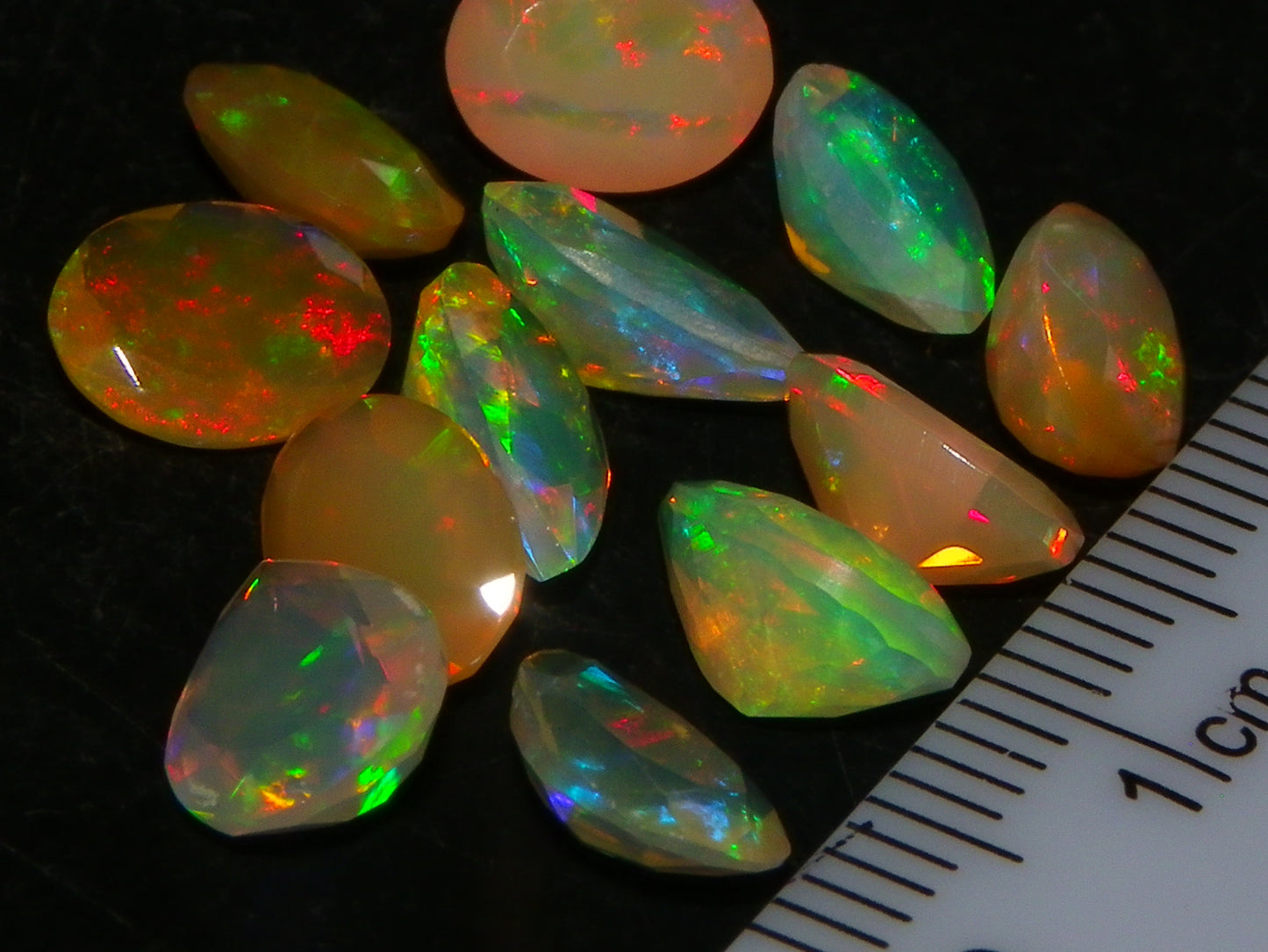 Nice Faceted Welo Crystal Opals 8.53cts Oval/Pear Crystal/Amber Base Fires :)