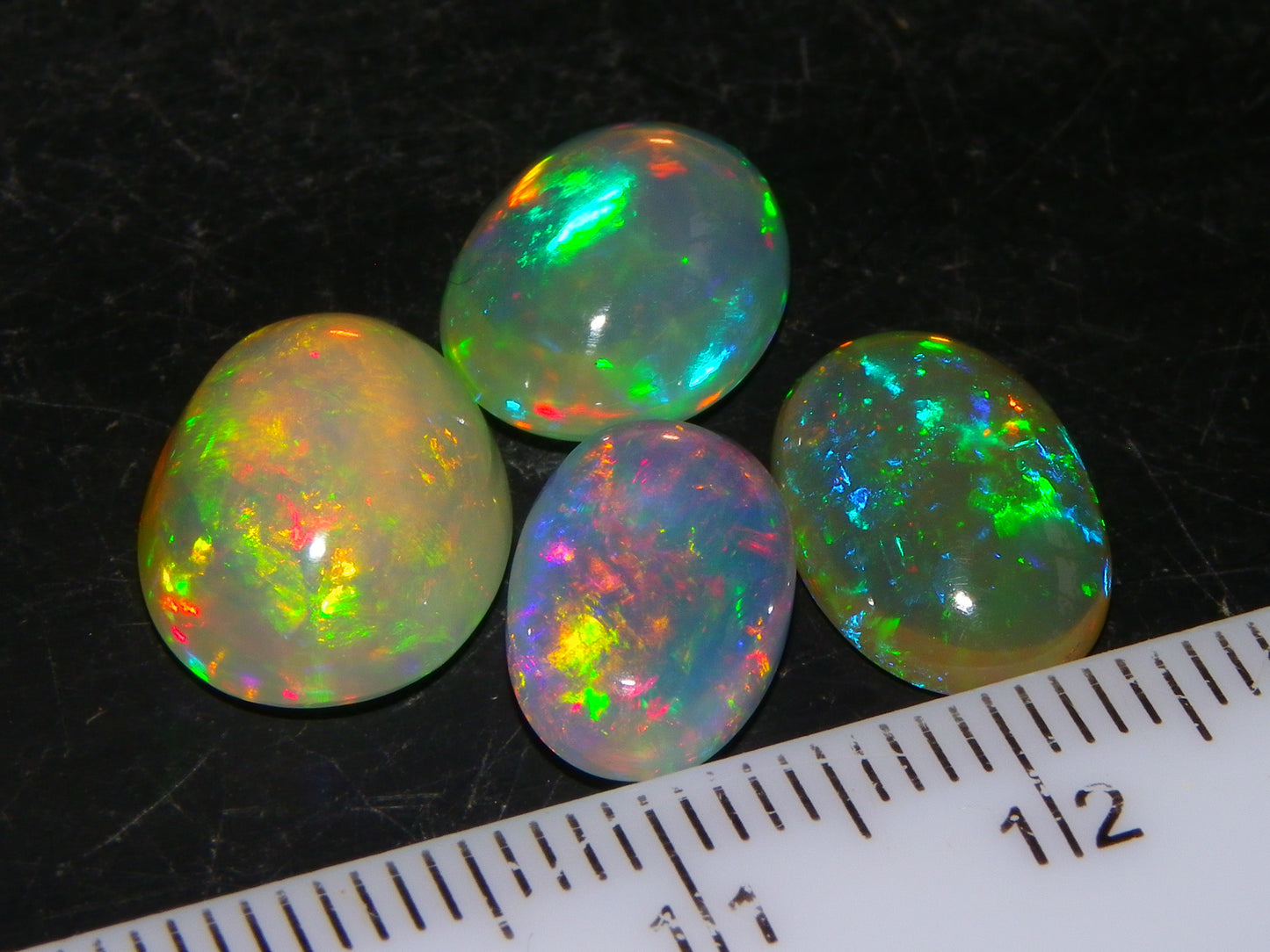 4 Nice Quality Ethiopian Welo Opal Cabs 10.5cts Multicolour Fires Green/Red/Blues