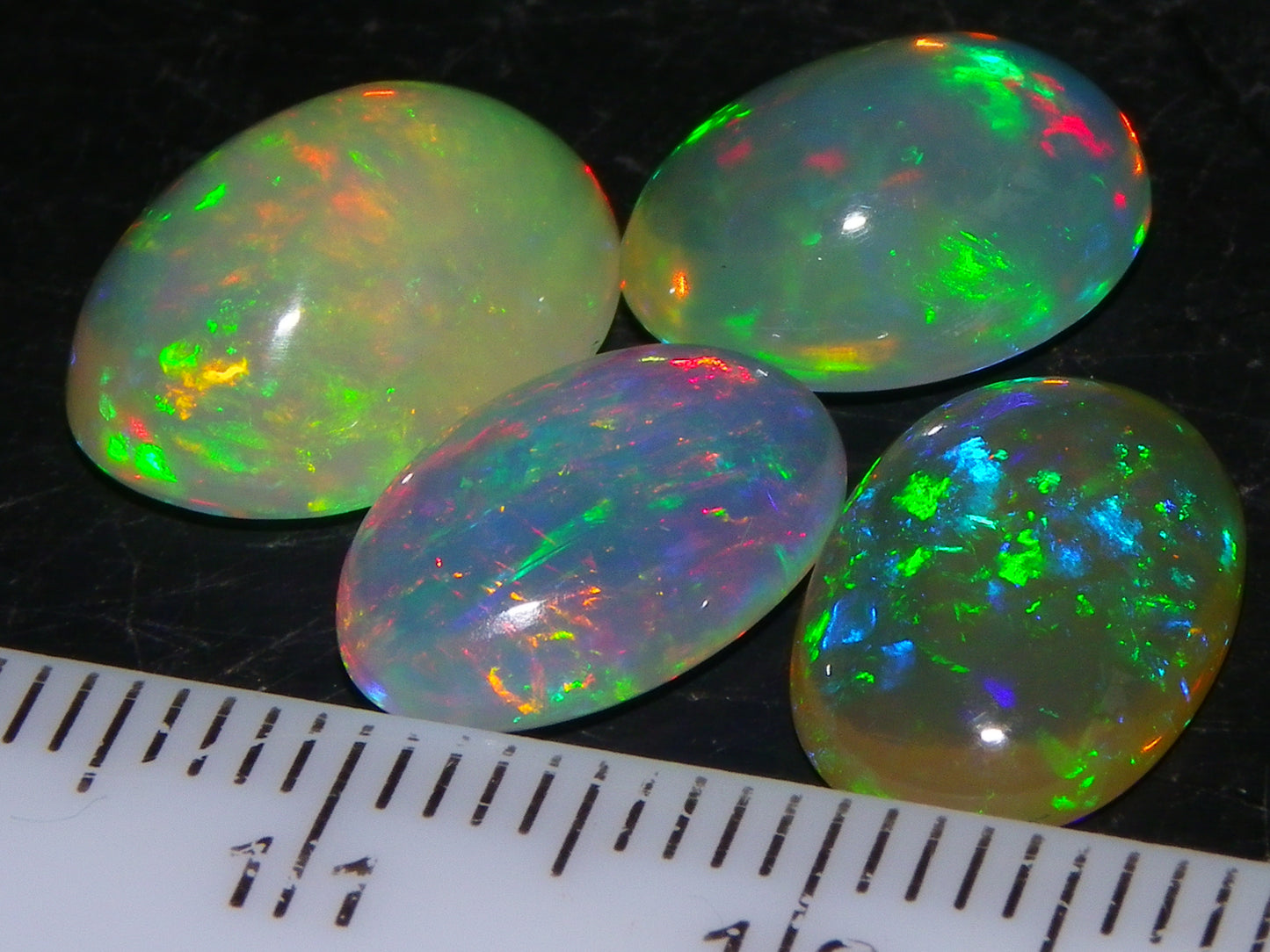 4 Nice Quality Ethiopian Welo Opal Cabs 10.5cts Multicolour Fires Green/Red/Blues