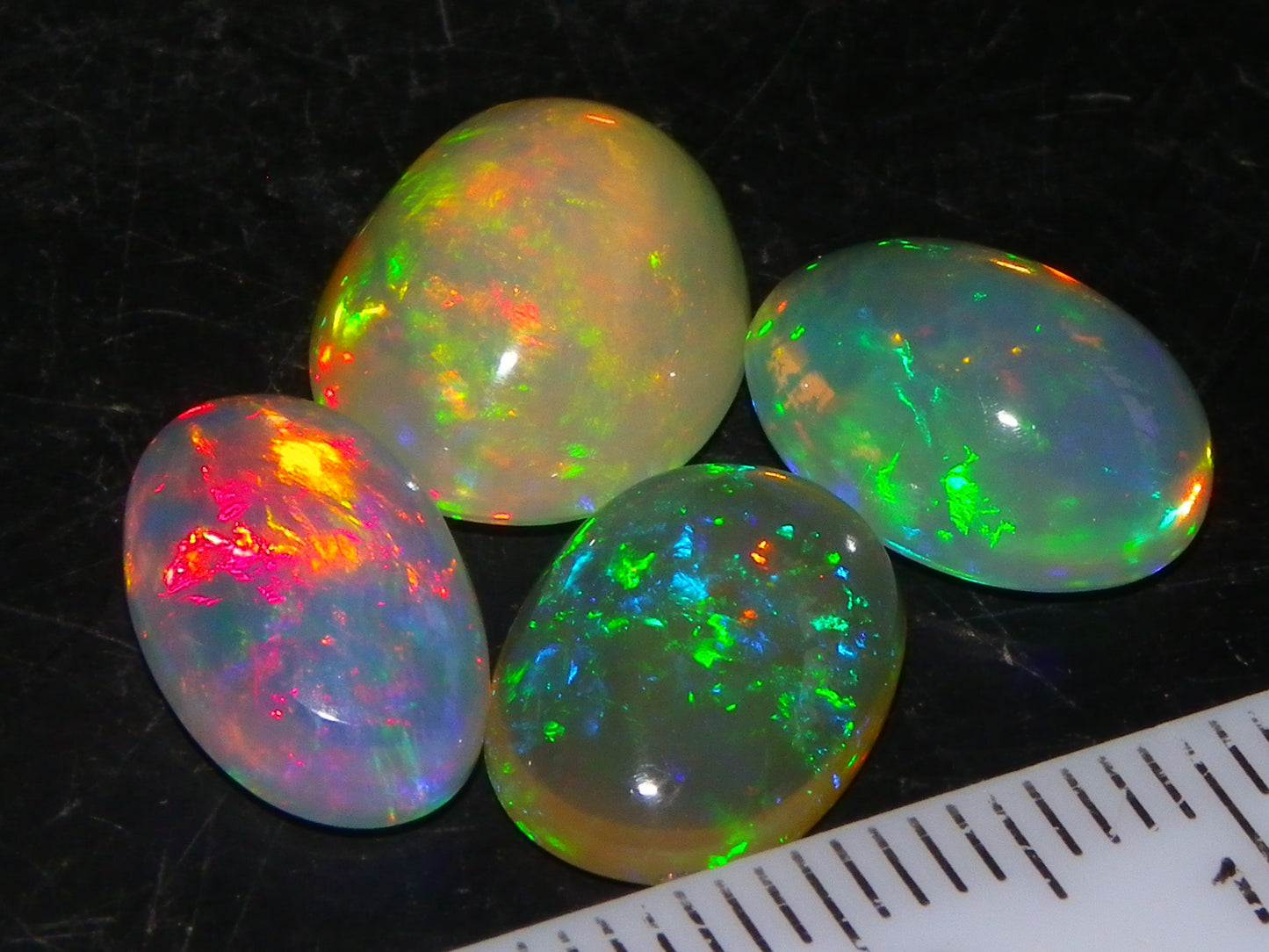 4 Nice Quality Ethiopian Welo Opal Cabs 10.5cts Multicolour Fires Green/Red/Blues