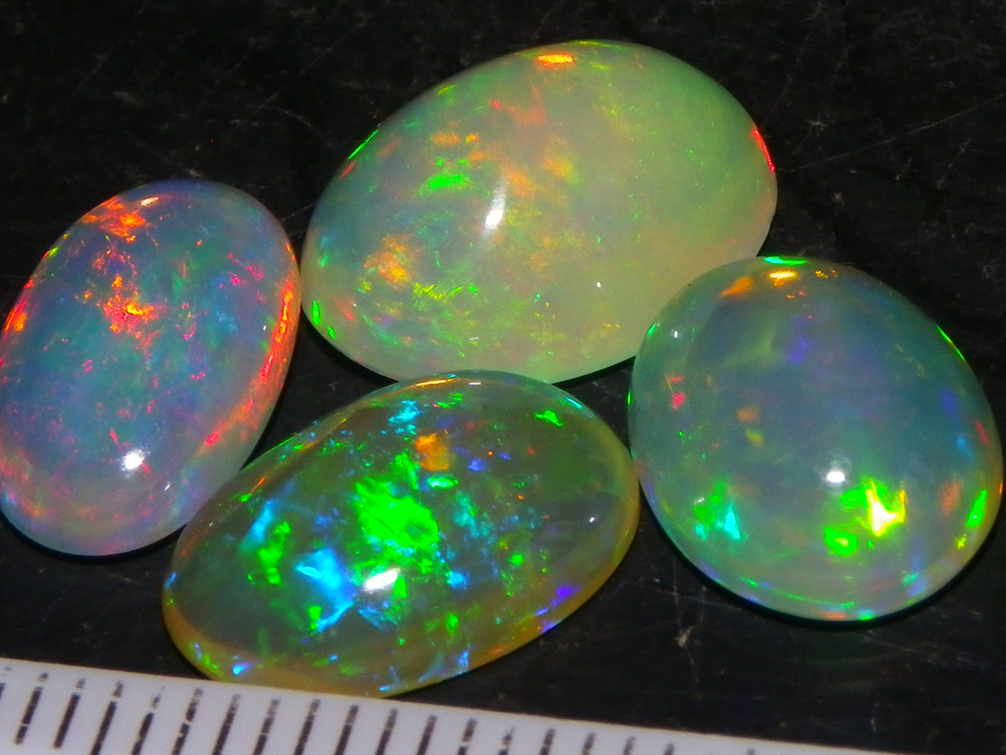 4 Nice Quality Ethiopian Welo Opal Cabs 10.5cts Multicolour Fires Green/Red/Blues