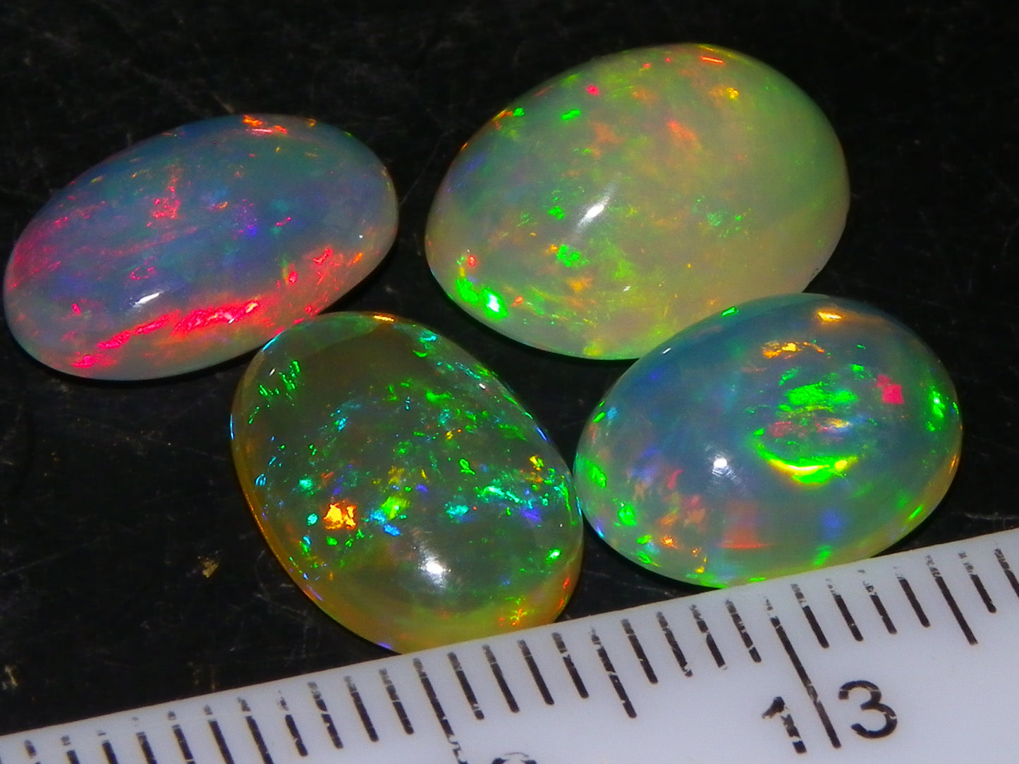 4 Nice Quality Ethiopian Welo Opal Cabs 10.5cts Multicolour Fires Green/Red/Blues