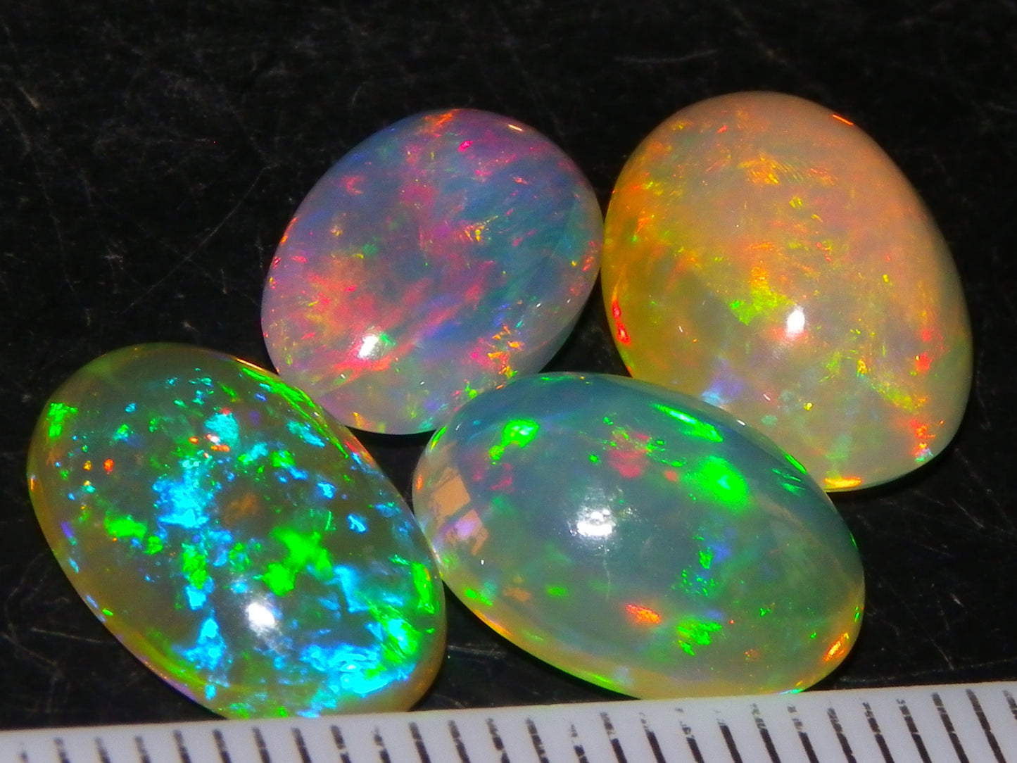 4 Nice Quality Ethiopian Welo Opal Cabs 10.5cts Multicolour Fires Green/Red/Blues