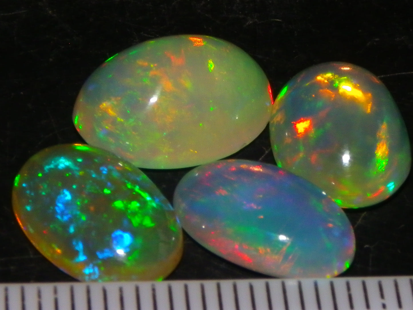 4 Nice Quality Ethiopian Welo Opal Cabs 10.5cts Multicolour Fires Green/Red/Blues