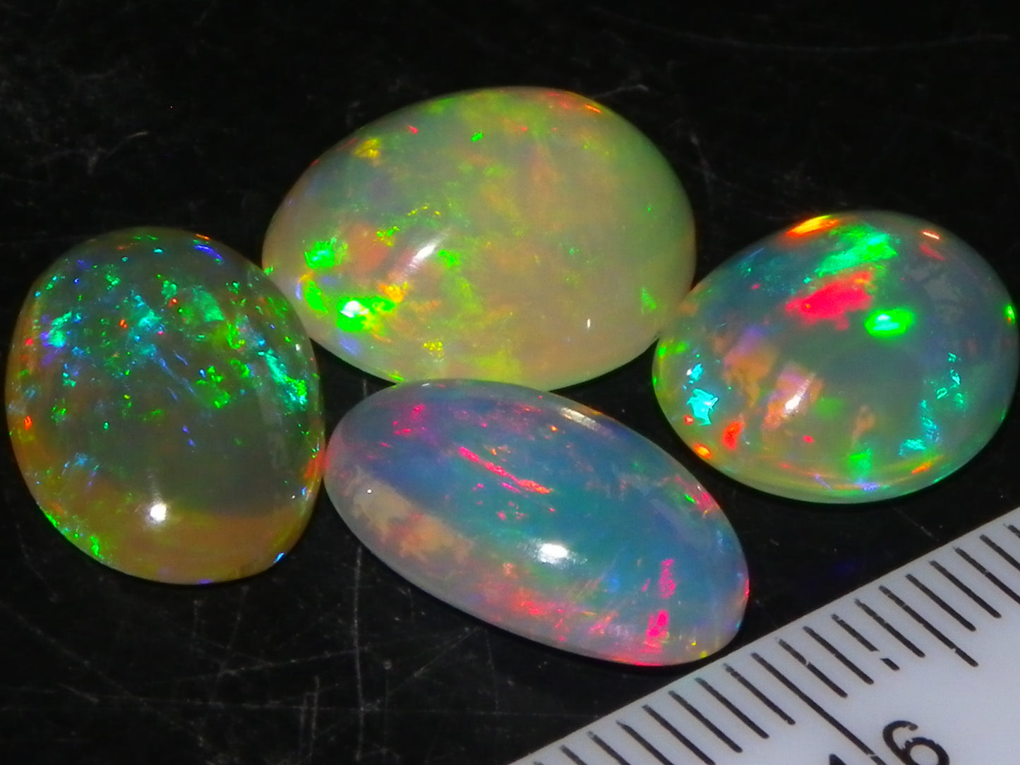 4 Nice Quality Ethiopian Welo Opal Cabs 10.5cts Multicolour Fires Green/Red/Blues