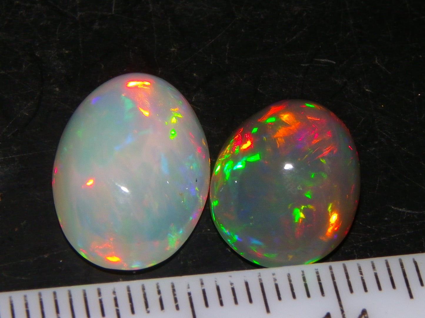 2 Nice Quality Cut/Polished Welo Crystal Opal Cabs 10.31cts Multicolours Fires  :)