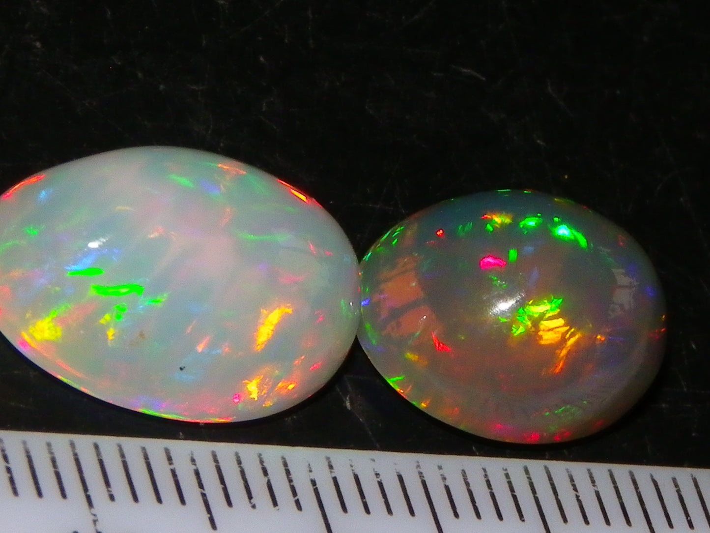 2 Nice Quality Cut/Polished Welo Crystal Opal Cabs 10.31cts Multicolours Fires  :)