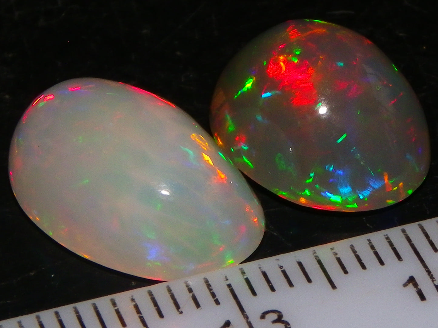 2 Nice Quality Cut/Polished Welo Crystal Opal Cabs 10.31cts Multicolours Fires  :)