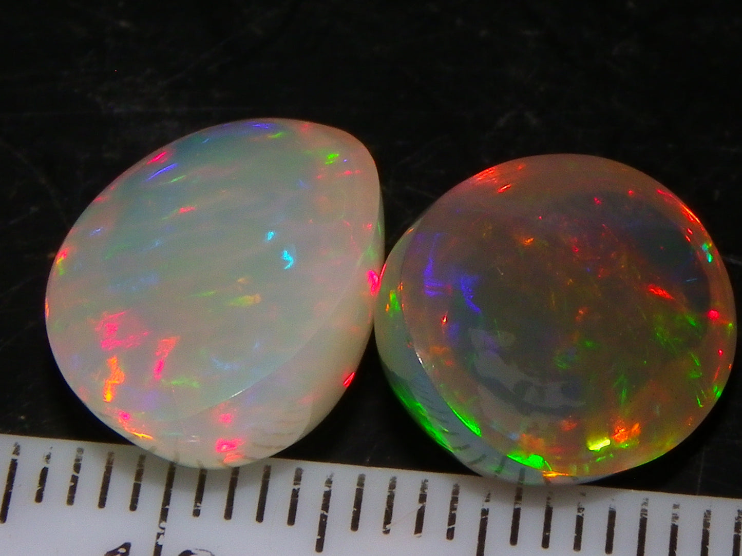 2 Nice Quality Cut/Polished Welo Crystal Opal Cabs 10.31cts Multicolours Fires  :)