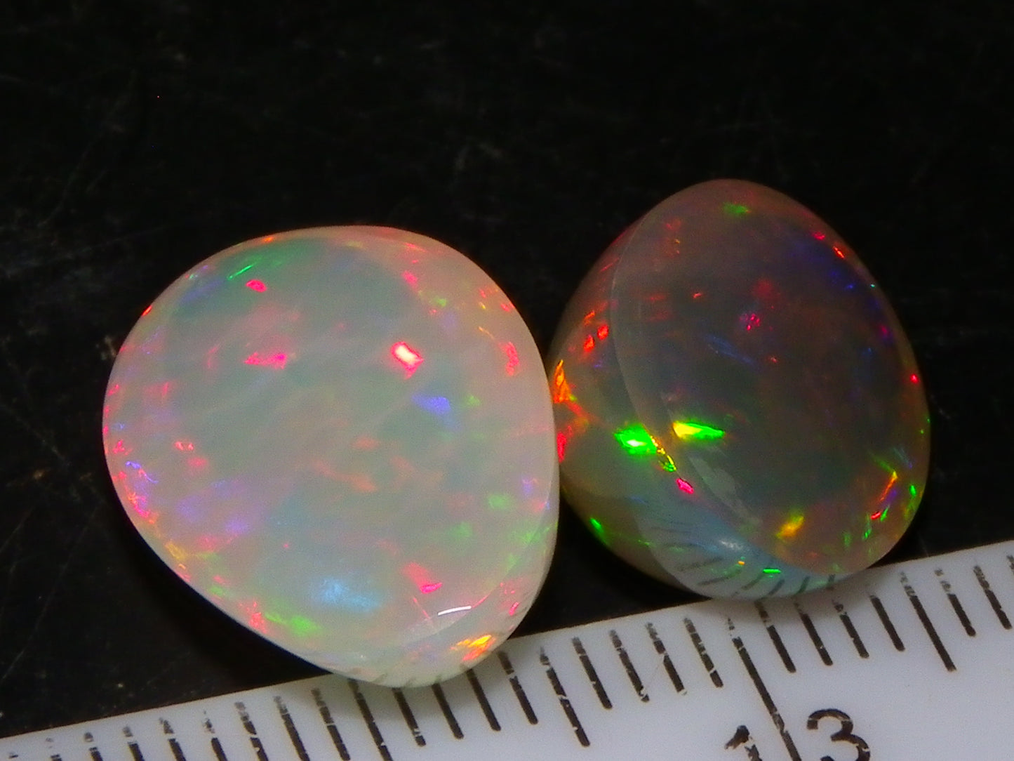 2 Nice Quality Cut/Polished Welo Crystal Opal Cabs 10.31cts Multicolours Fires  :)