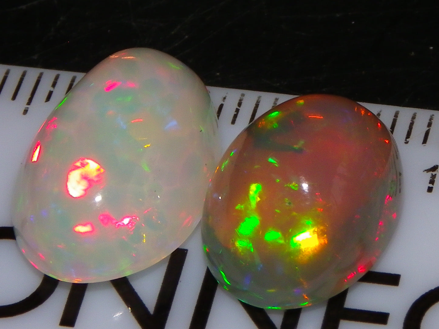 2 Nice Quality Cut/Polished Welo Crystal Opal Cabs 10.31cts Multicolours Fires  :)