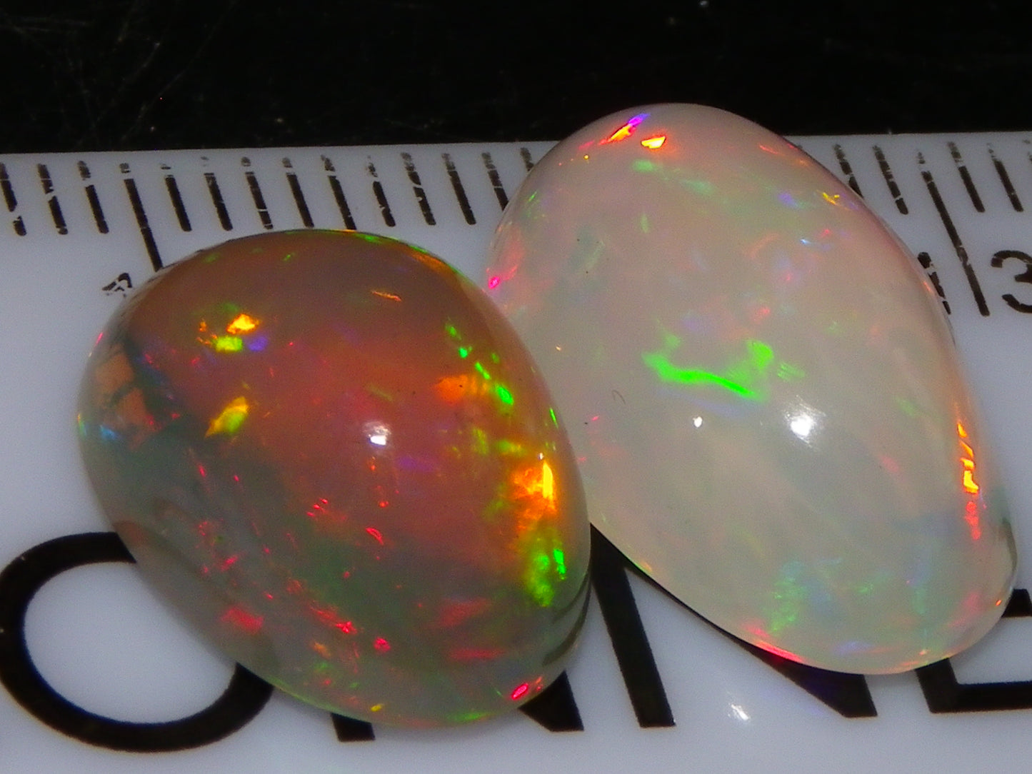 2 Nice Quality Cut/Polished Welo Crystal Opal Cabs 10.31cts Multicolours Fires  :)