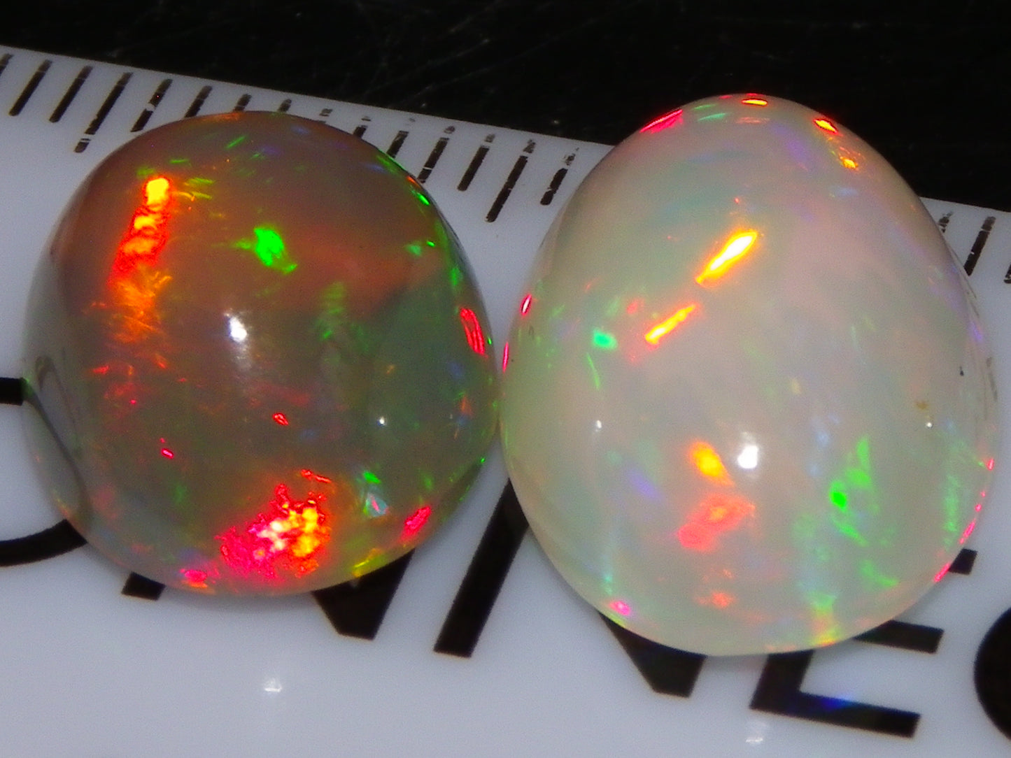 2 Nice Quality Cut/Polished Welo Crystal Opal Cabs 10.31cts Multicolours Fires  :)