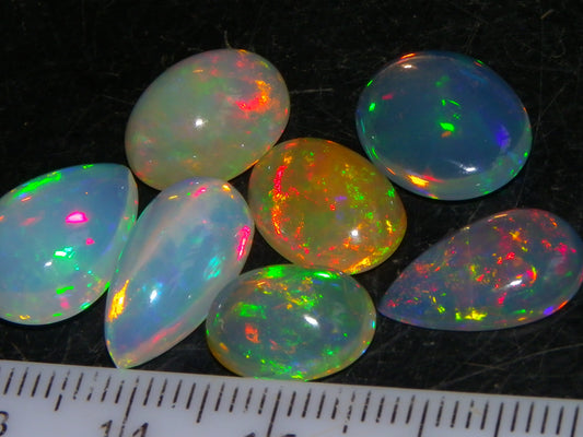 7 Nice Welo Crystal Opal Cabs 20.78cts Multicolour Fires Ethiopia