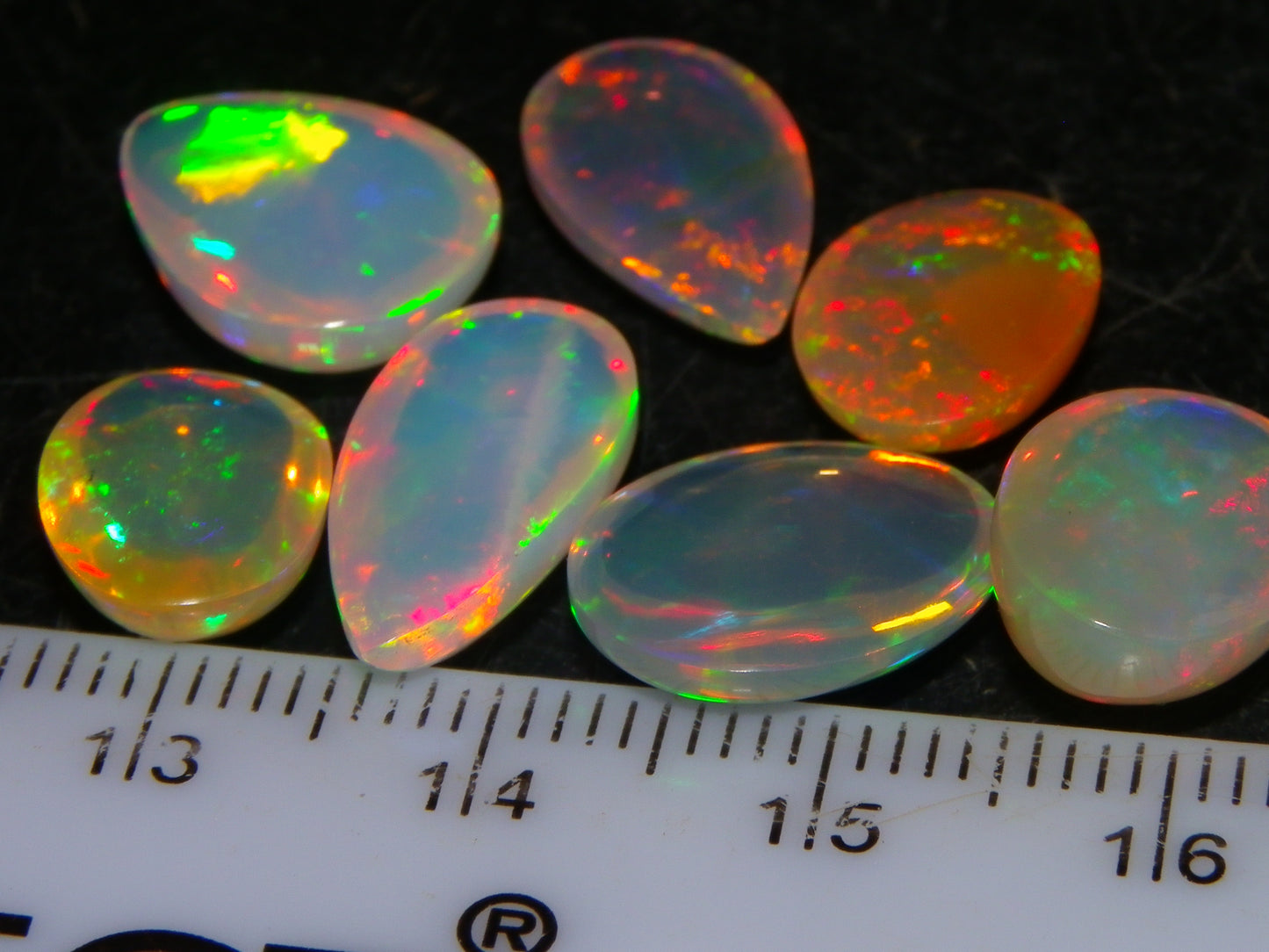 7 Nice Welo Crystal Opal Cabs 20.78cts Multicolour Fires Ethiopia