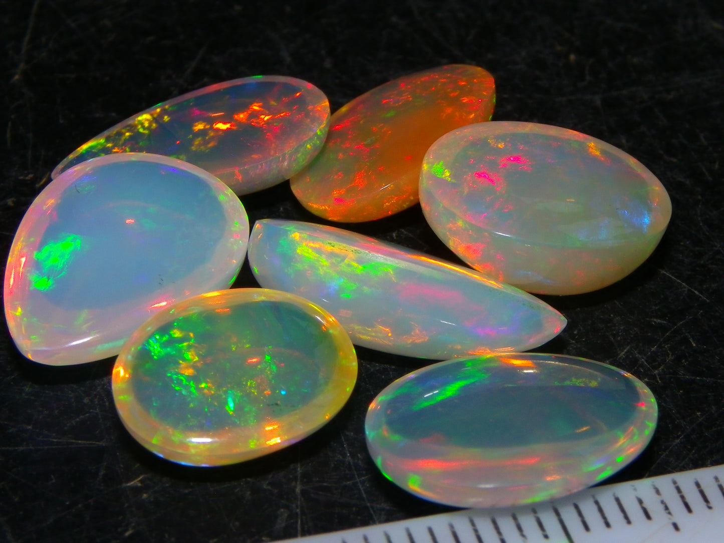 7 Nice Welo Crystal Opal Cabs 20.78cts Multicolour Fires Ethiopia
