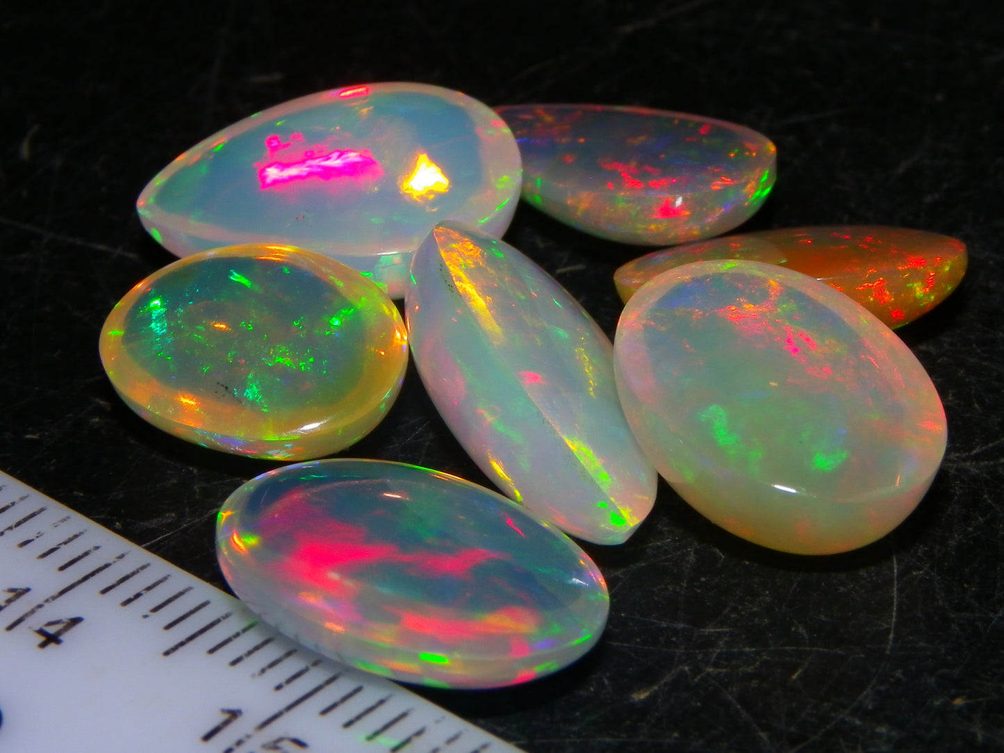 7 Nice Welo Crystal Opal Cabs 20.78cts Multicolour Fires Ethiopia