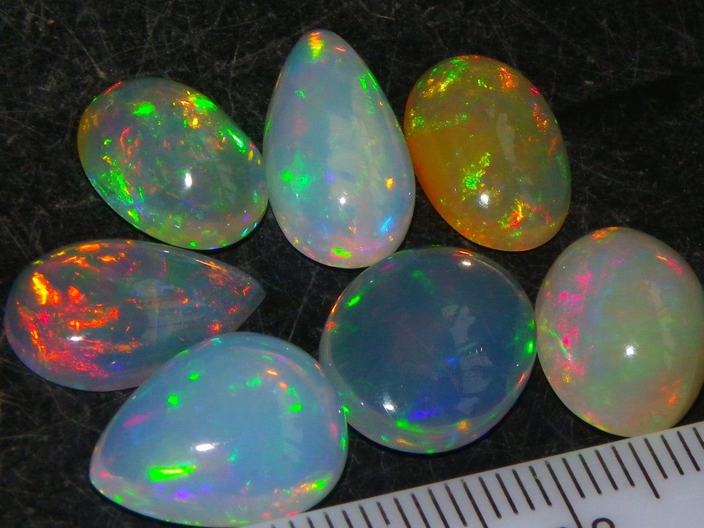 7 Nice Welo Crystal Opal Cabs 20.78cts Multicolour Fires Ethiopia