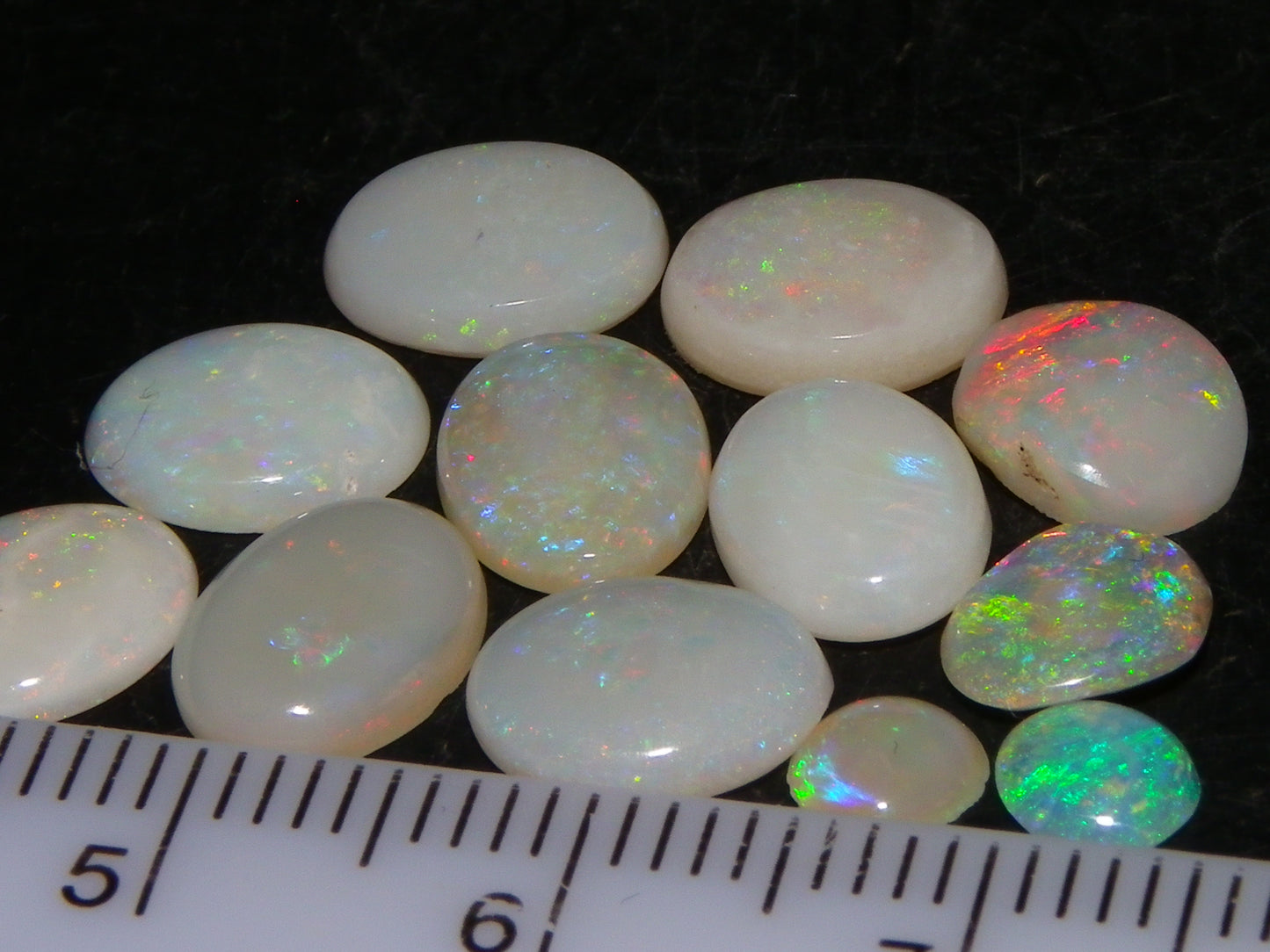 12 Cut/Polished Coober Pedy Opal Cabs 9.51cts Multicolour Fires White/Milky Base