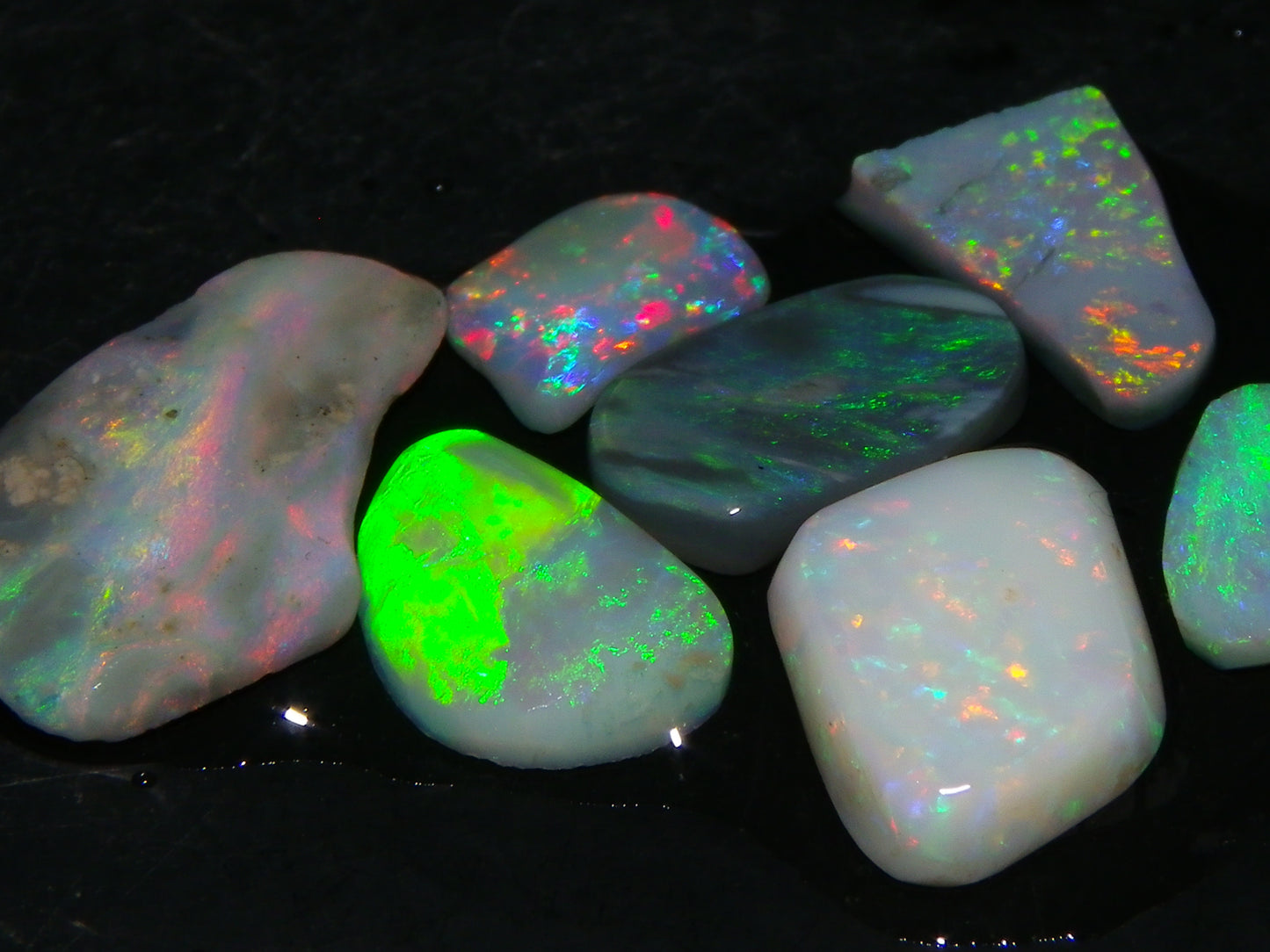 7 Nice Lightning Ridge Opal Rubs/Rough Preforms 12.4cts Mixed Fires, Base Red/Greens Au