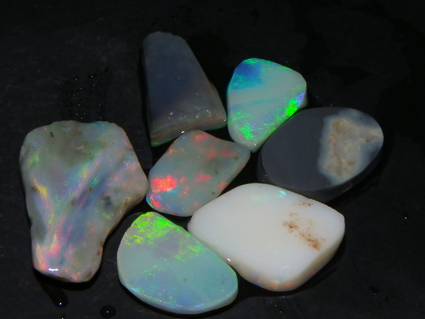 7 Nice Lightning Ridge Opal Rubs/Rough Preforms 12.4cts Mixed Fires, Base Red/Greens Au