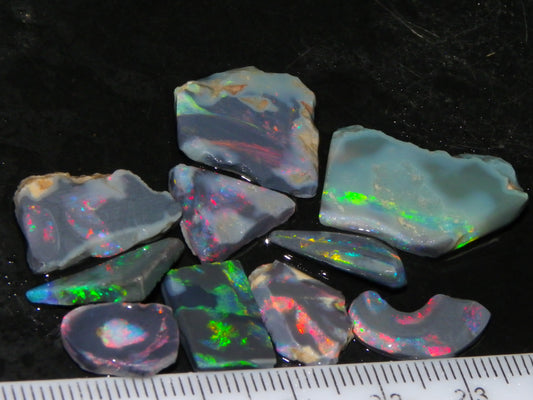 Nice Rough/Rubbed/Sliced Lightning Ridge Opal Parcel 32.9cts Red/Green Fires Dark Base