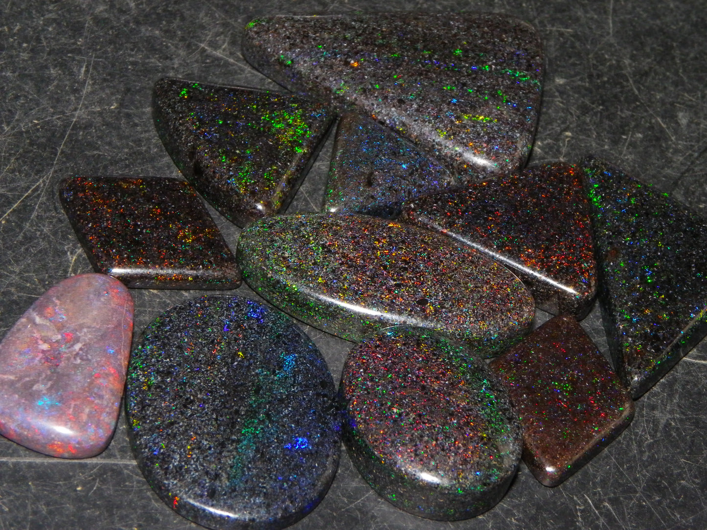 13 Nice Cut/Polished /Treated Andamooka Matrix Opals 143cts Red/Green/Blue Fires