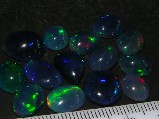 14 Nice Cut/Polished Smoked/Dark Welo Crystal Opal cabs 21.4cts Mixed Fires :)