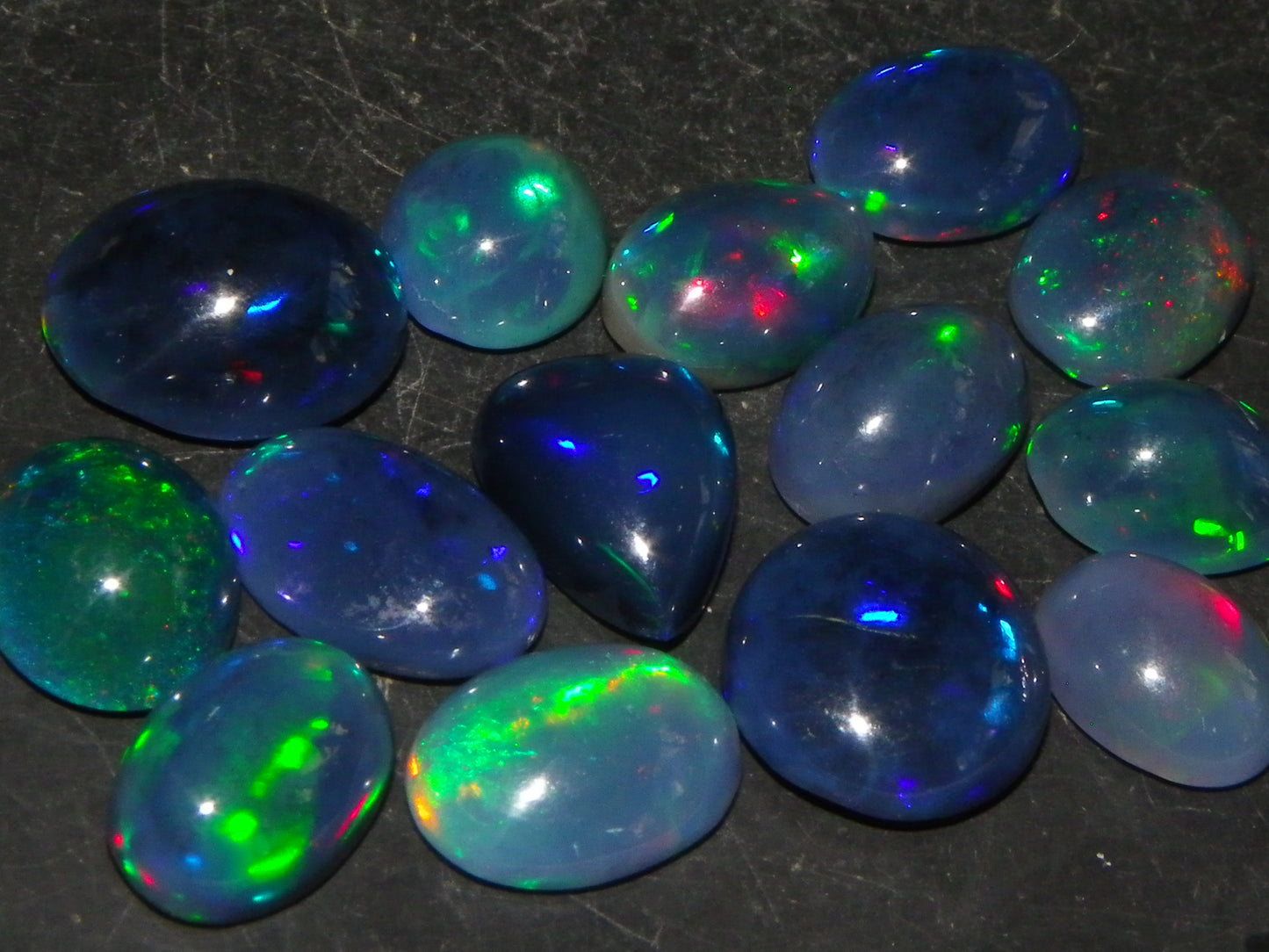 14 Nice Cut/Polished Smoked/Dark Welo Crystal Opal cabs 21.4cts Mixed Fires :)