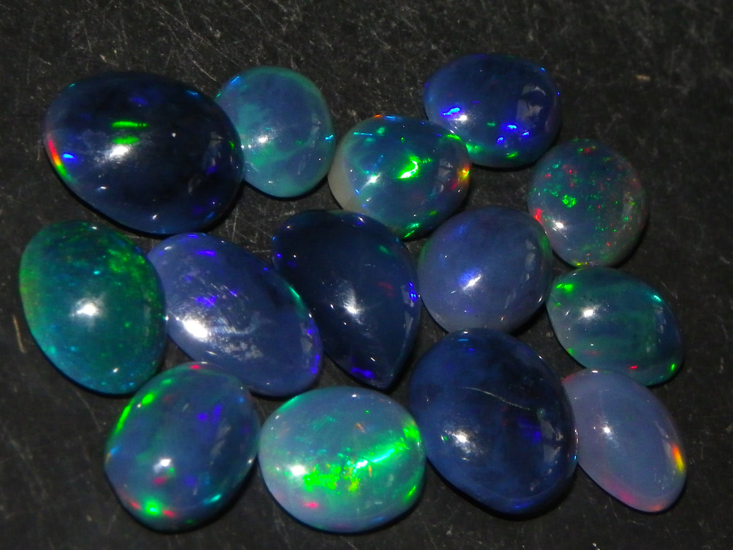 14 Nice Cut/Polished Smoked/Dark Welo Crystal Opal cabs 21.4cts Mixed Fires :)