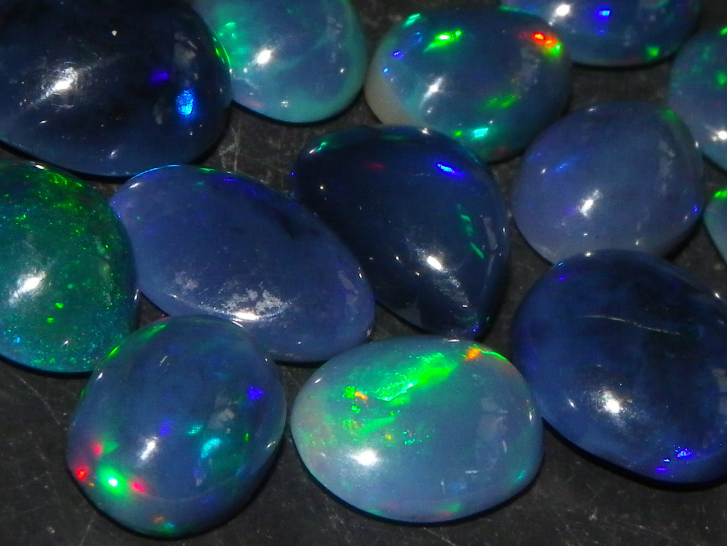 14 Nice Cut/Polished Smoked/Dark Welo Crystal Opal cabs 21.4cts Mixed Fires :)