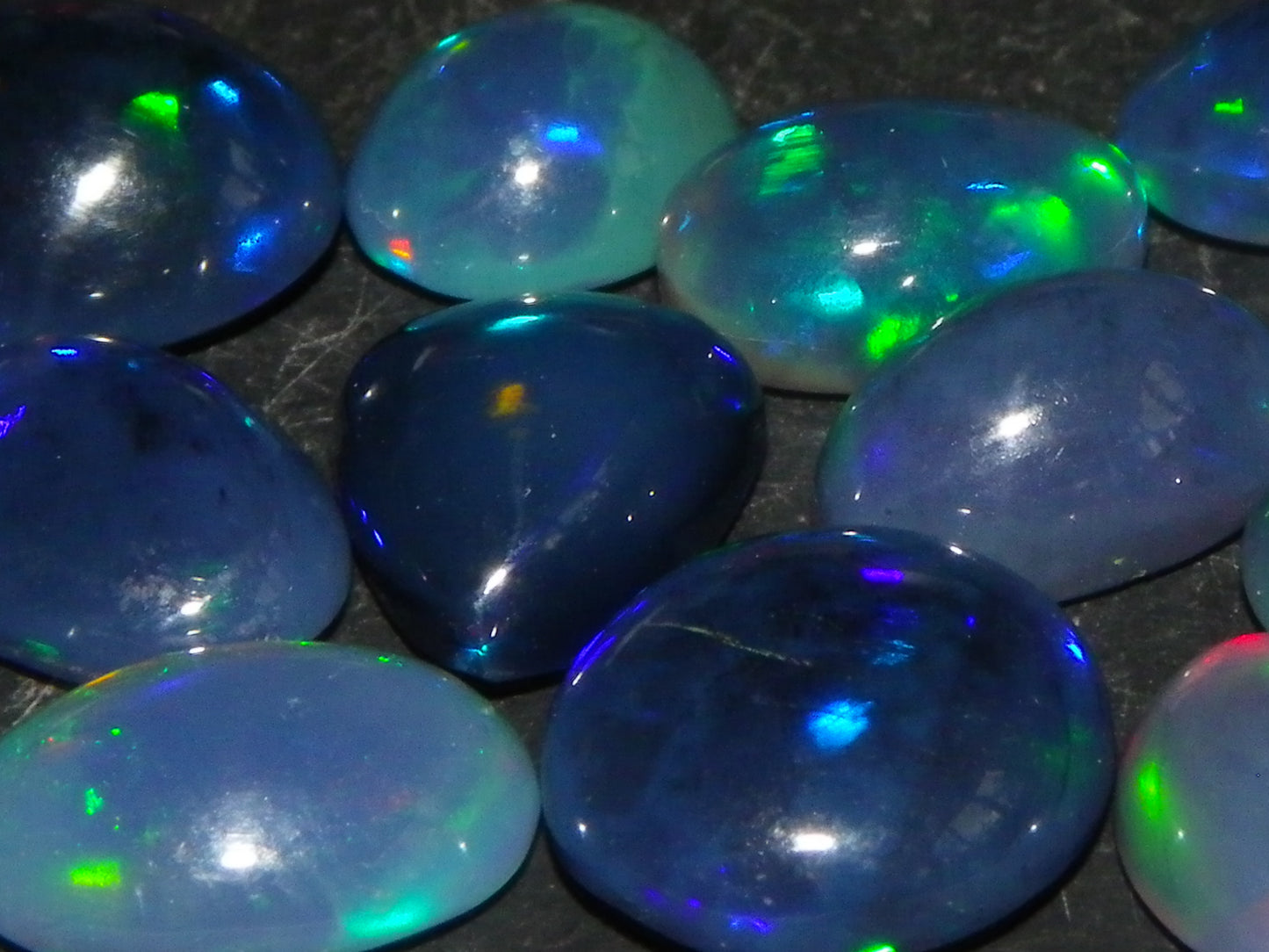 14 Nice Cut/Polished Smoked/Dark Welo Crystal Opal cabs 21.4cts Mixed Fires :)