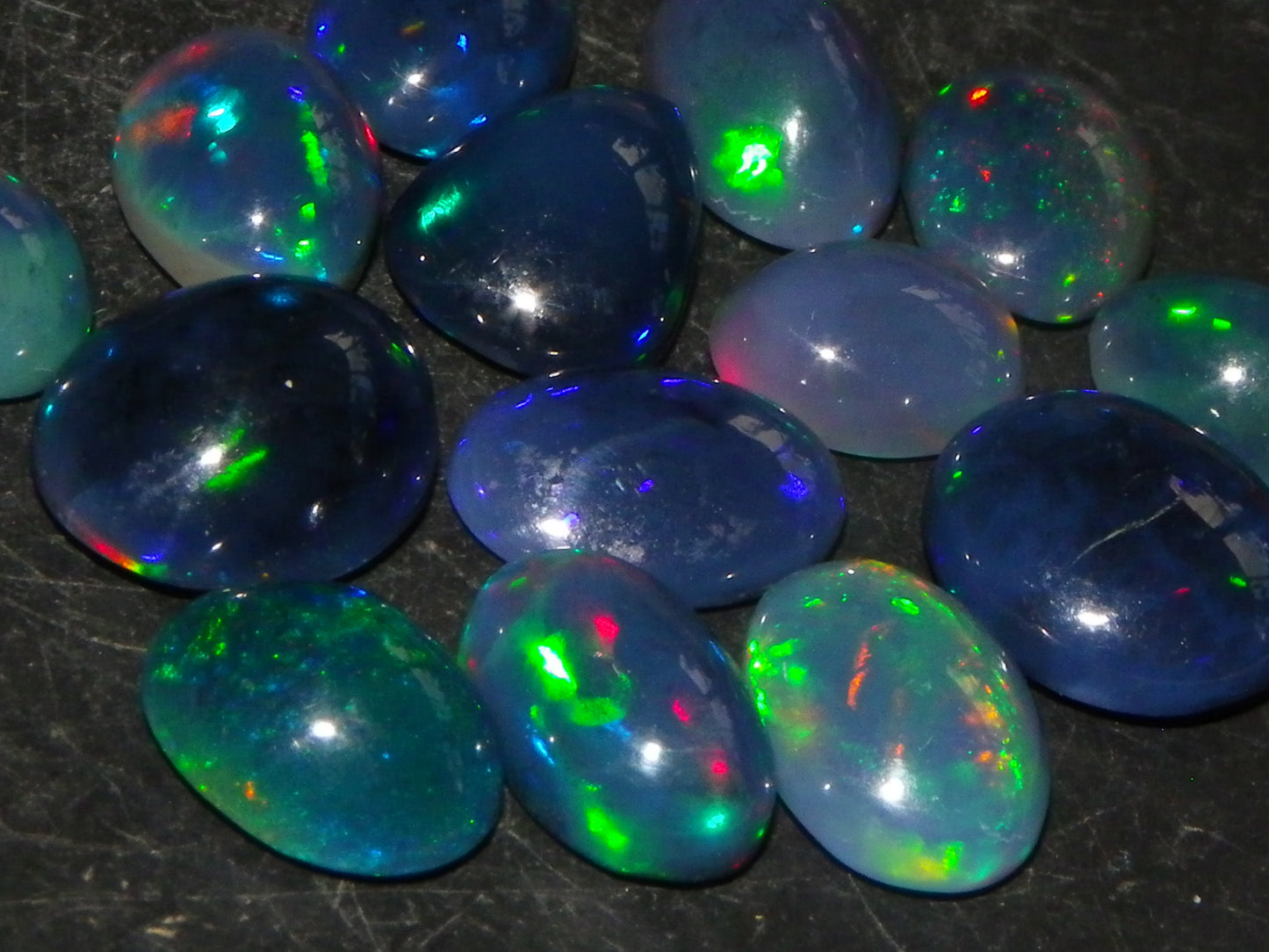 14 Nice Cut/Polished Smoked/Dark Welo Crystal Opal cabs 21.4cts Mixed Fires :)