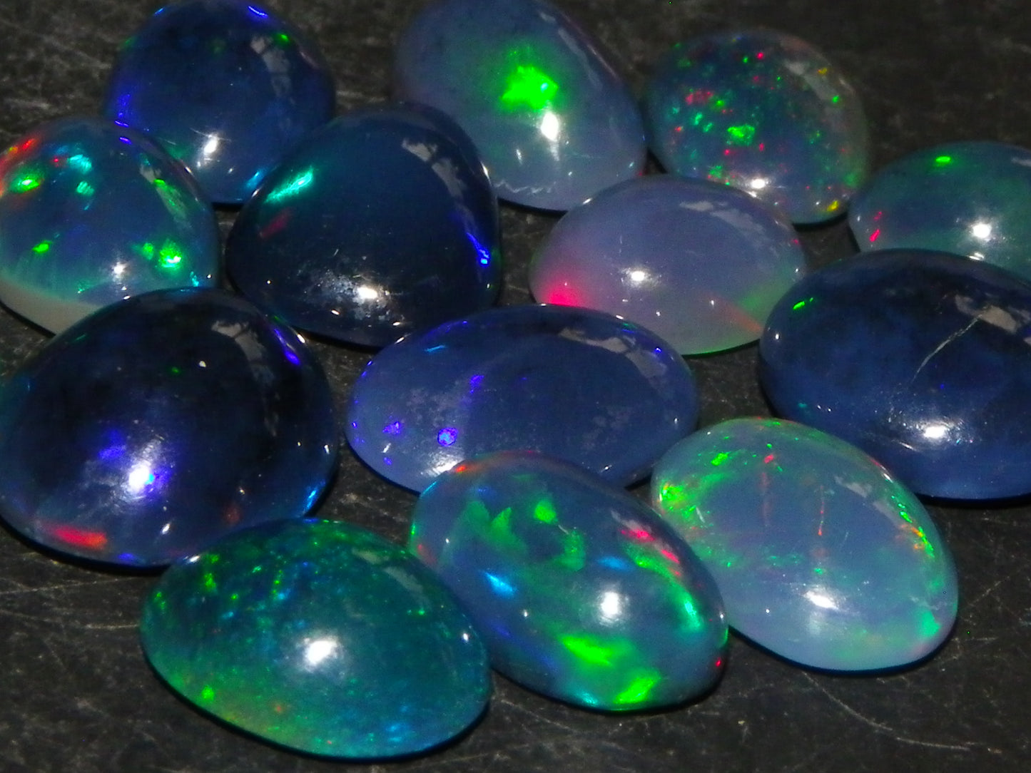 14 Nice Cut/Polished Smoked/Dark Welo Crystal Opal cabs 21.4cts Mixed Fires :)