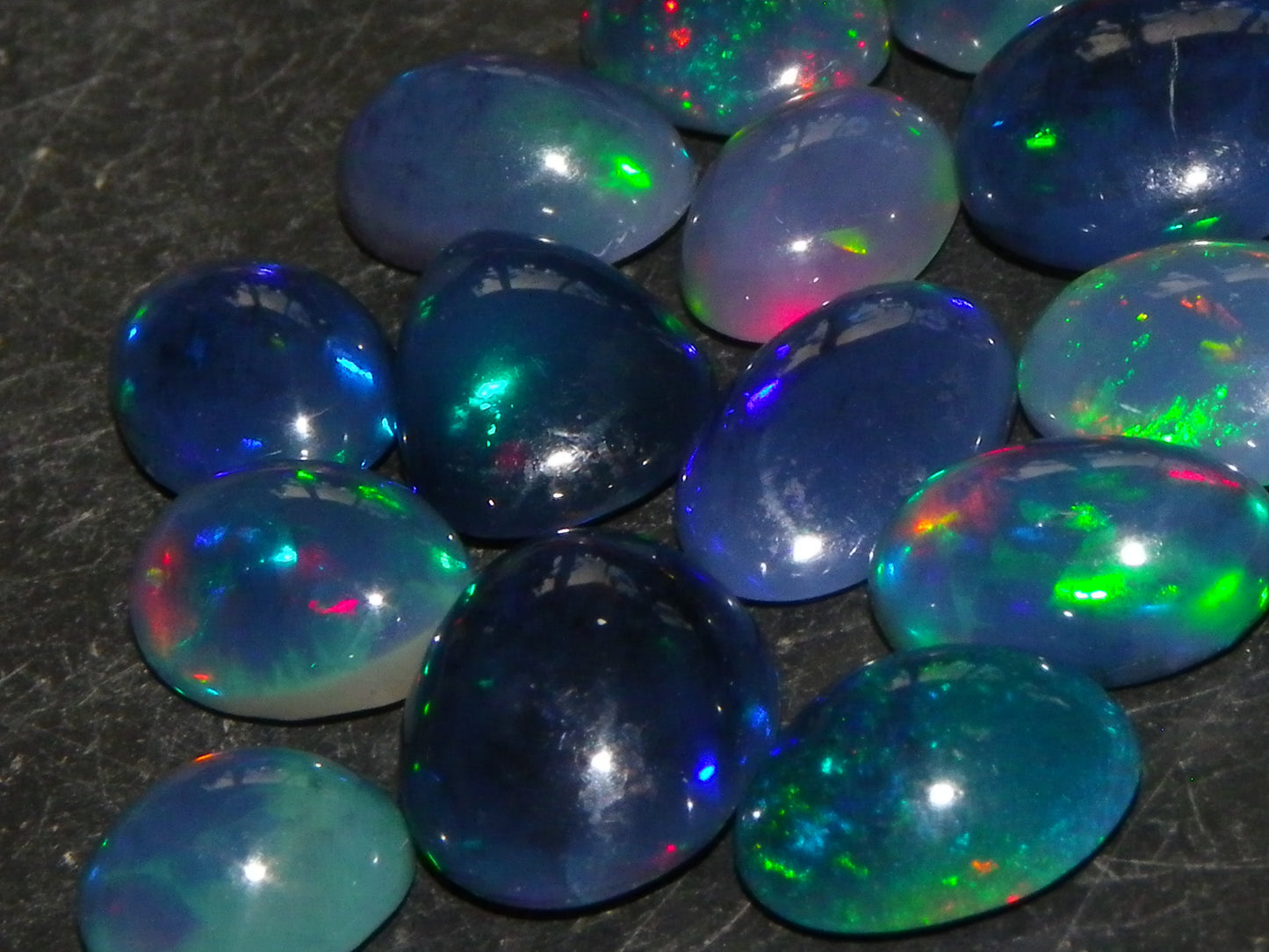 14 Nice Cut/Polished Smoked/Dark Welo Crystal Opal cabs 21.4cts Mixed Fires :)