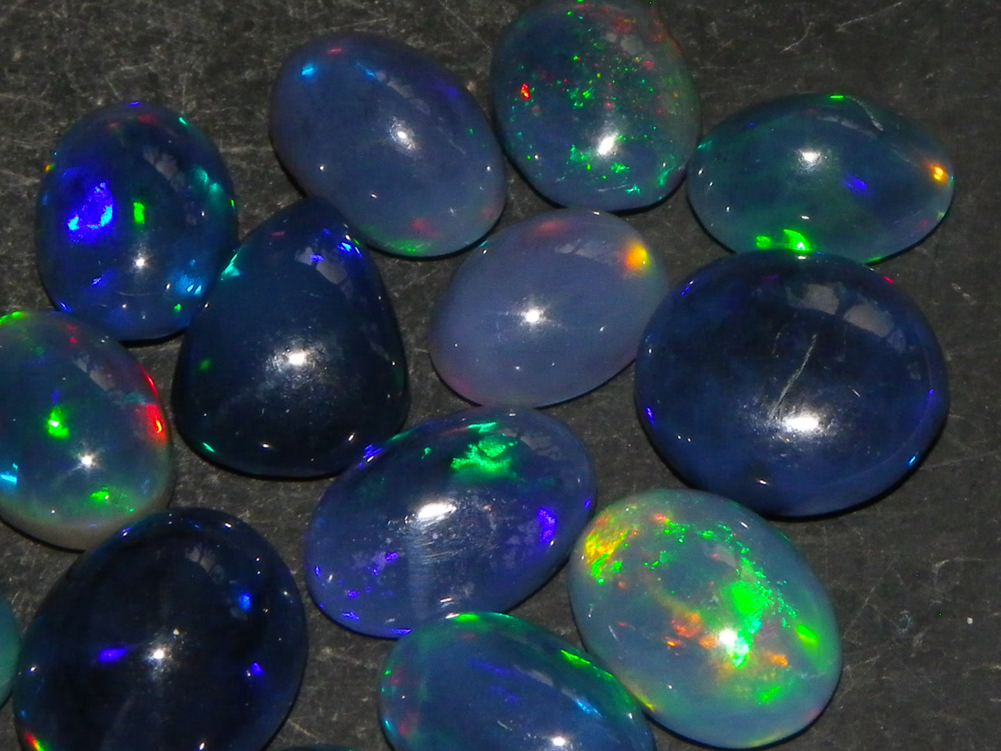 14 Nice Cut/Polished Smoked/Dark Welo Crystal Opal cabs 21.4cts Mixed Fires :)