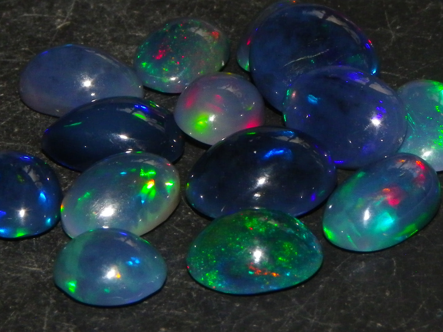 14 Nice Cut/Polished Smoked/Dark Welo Crystal Opal cabs 21.4cts Mixed Fires :)