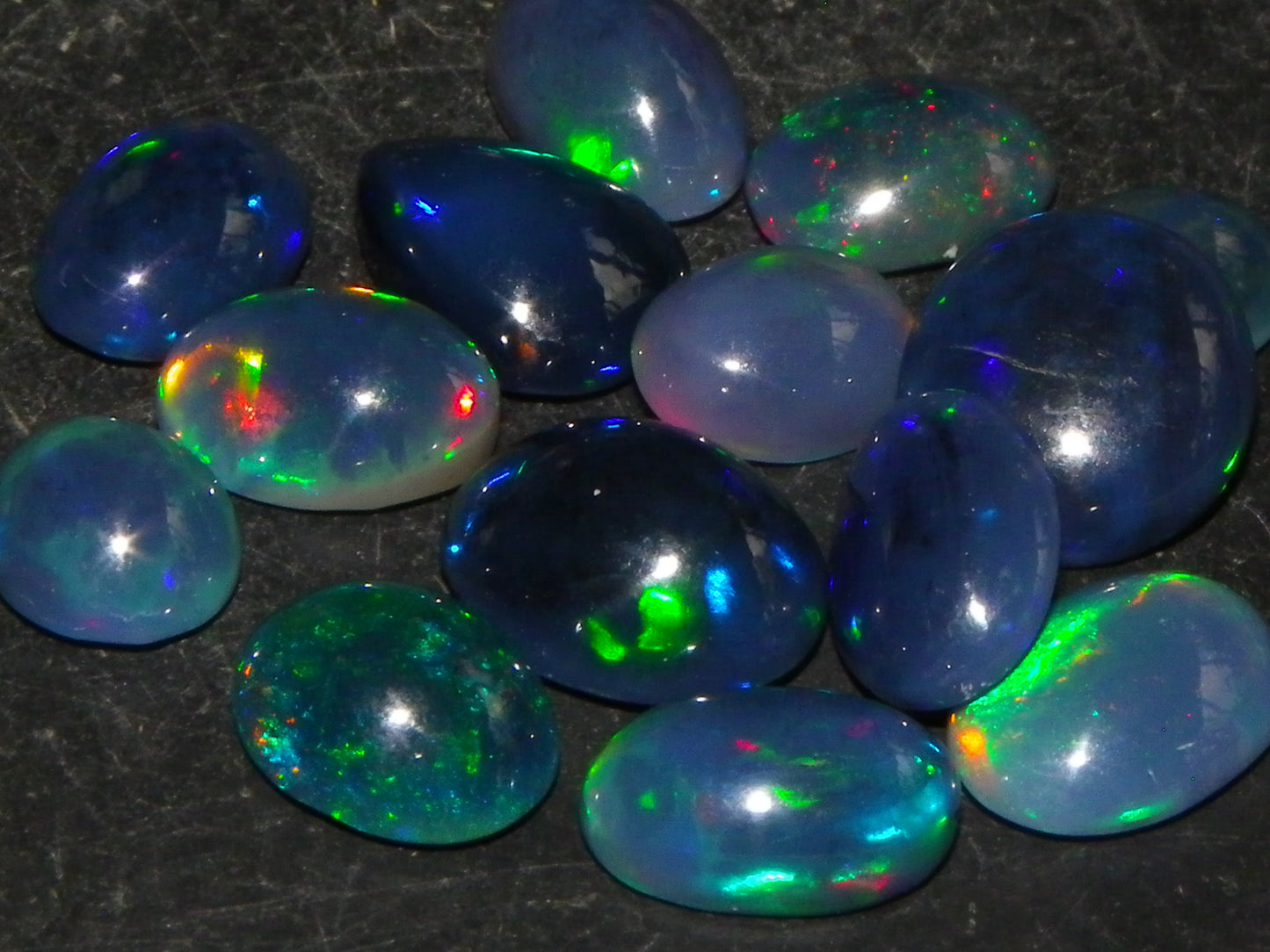 14 Nice Cut/Polished Smoked/Dark Welo Crystal Opal cabs 21.4cts Mixed Fires :)