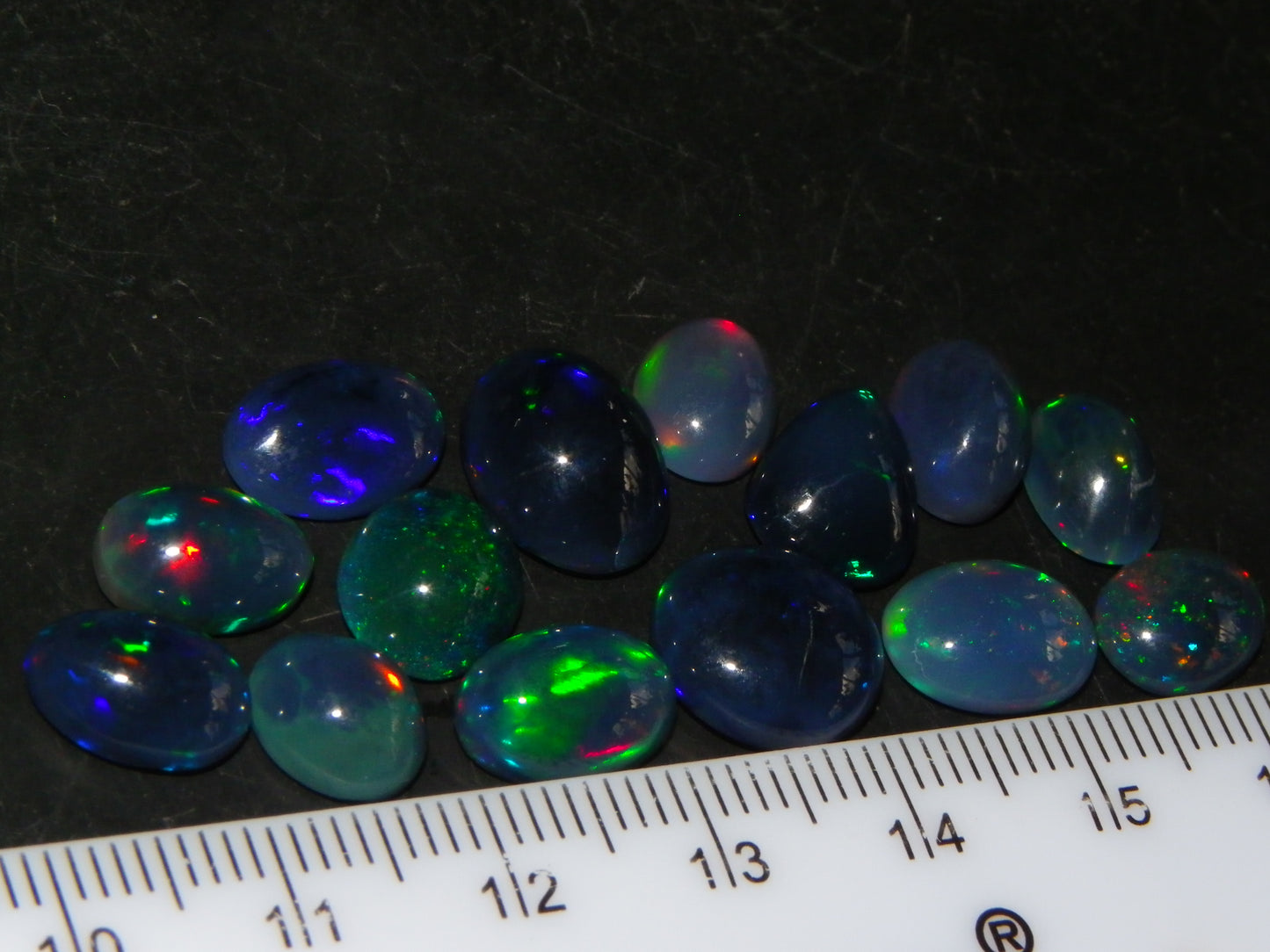 14 Nice Cut/Polished Smoked/Dark Welo Crystal Opal cabs 21.4cts Mixed Fires :)