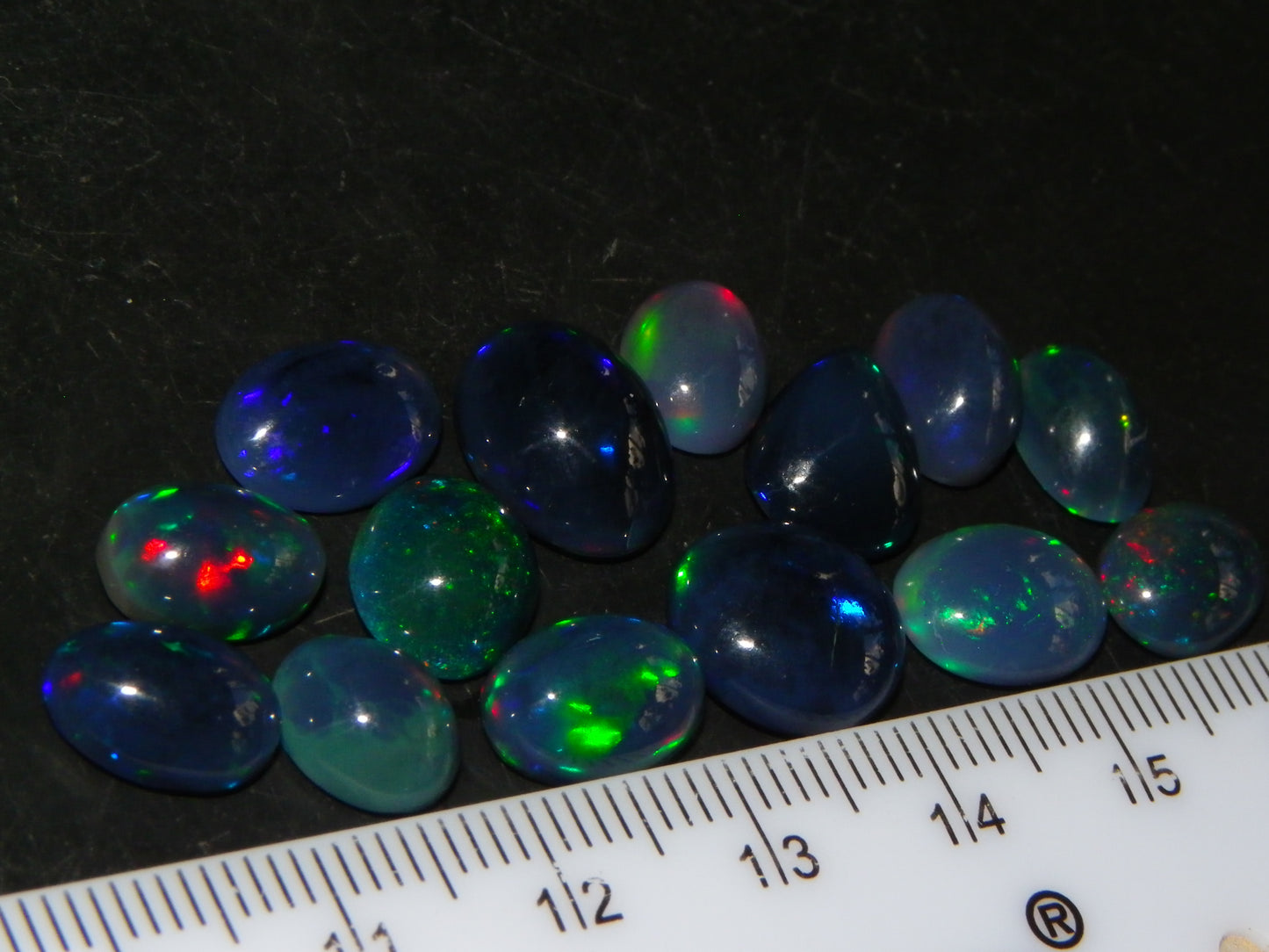 14 Nice Cut/Polished Smoked/Dark Welo Crystal Opal cabs 21.4cts Mixed Fires :)