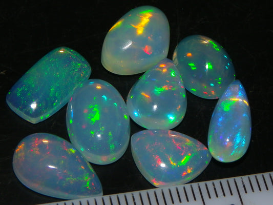 8 Nice Welo Crystal Opals / Cabs 17.2cts Multicolour Fires Ethiopia :)